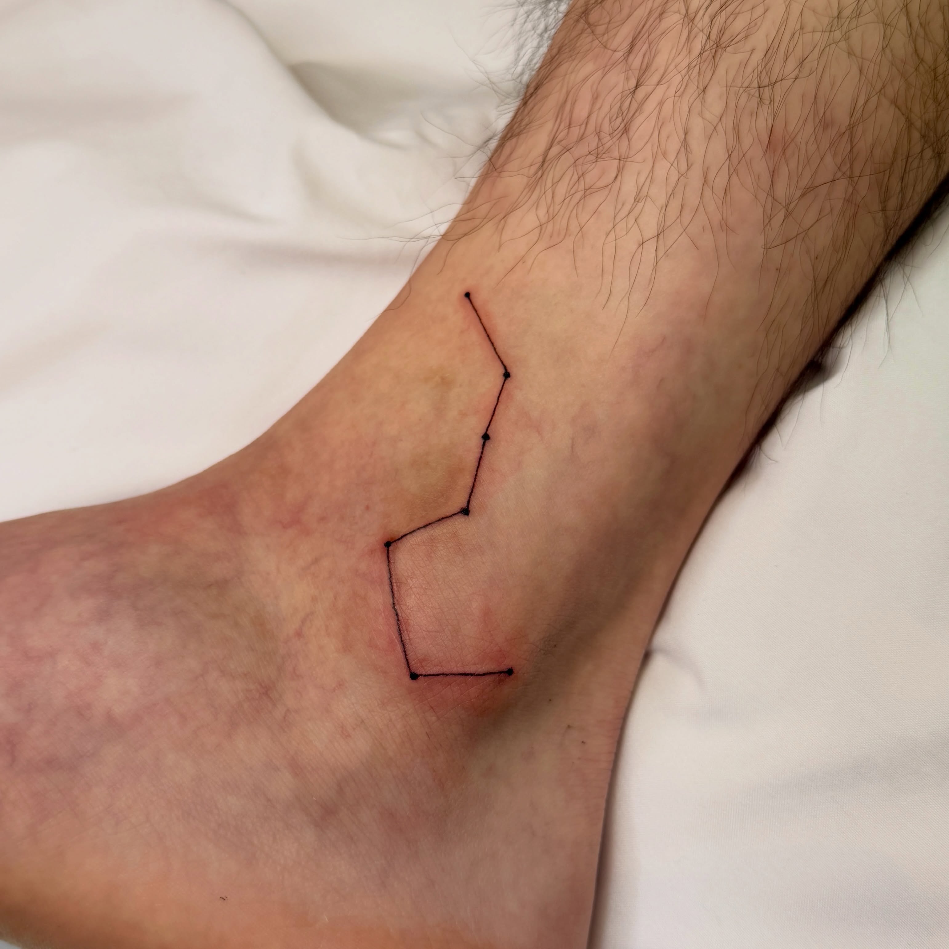 Tattoo by @maru_ttttt — geometric