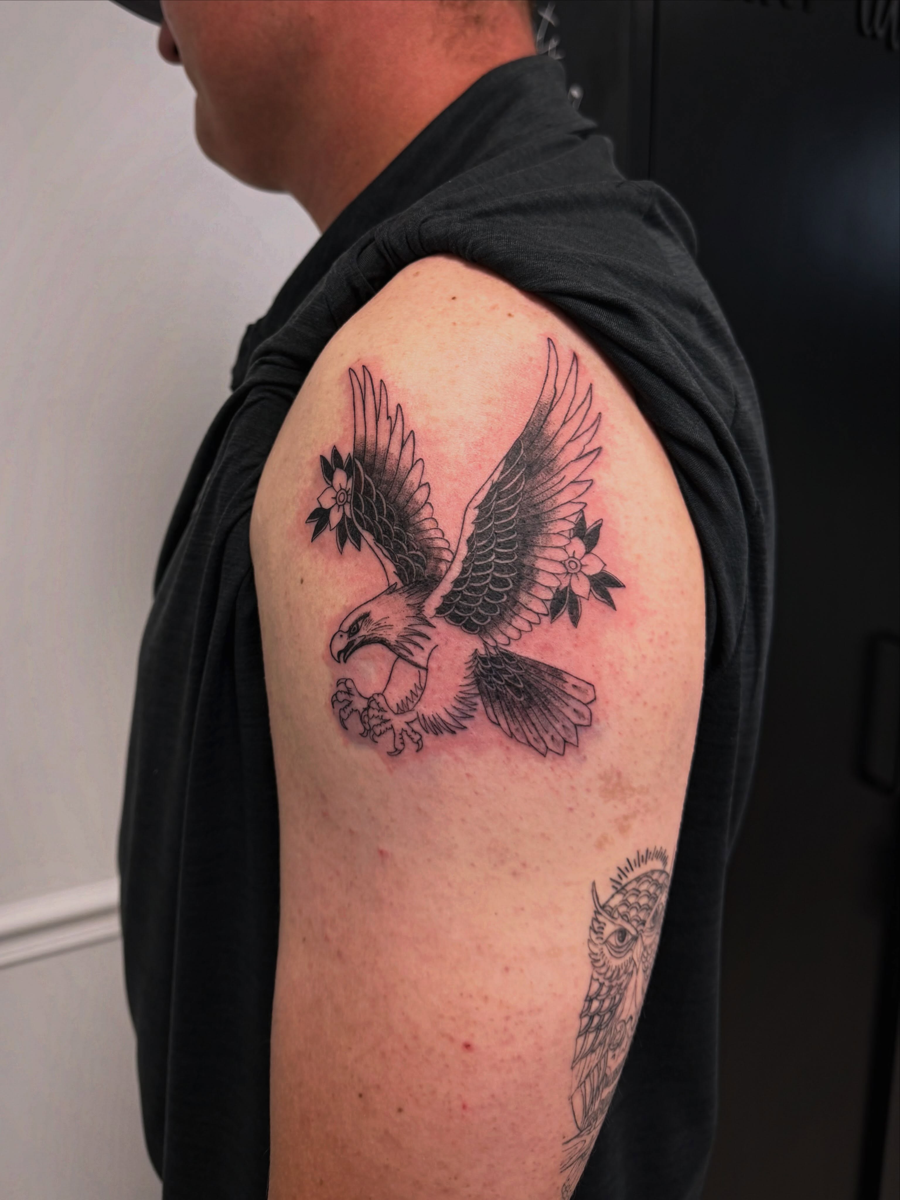Eagle American traditional tattoo on the shoulder by Taylor Johnson