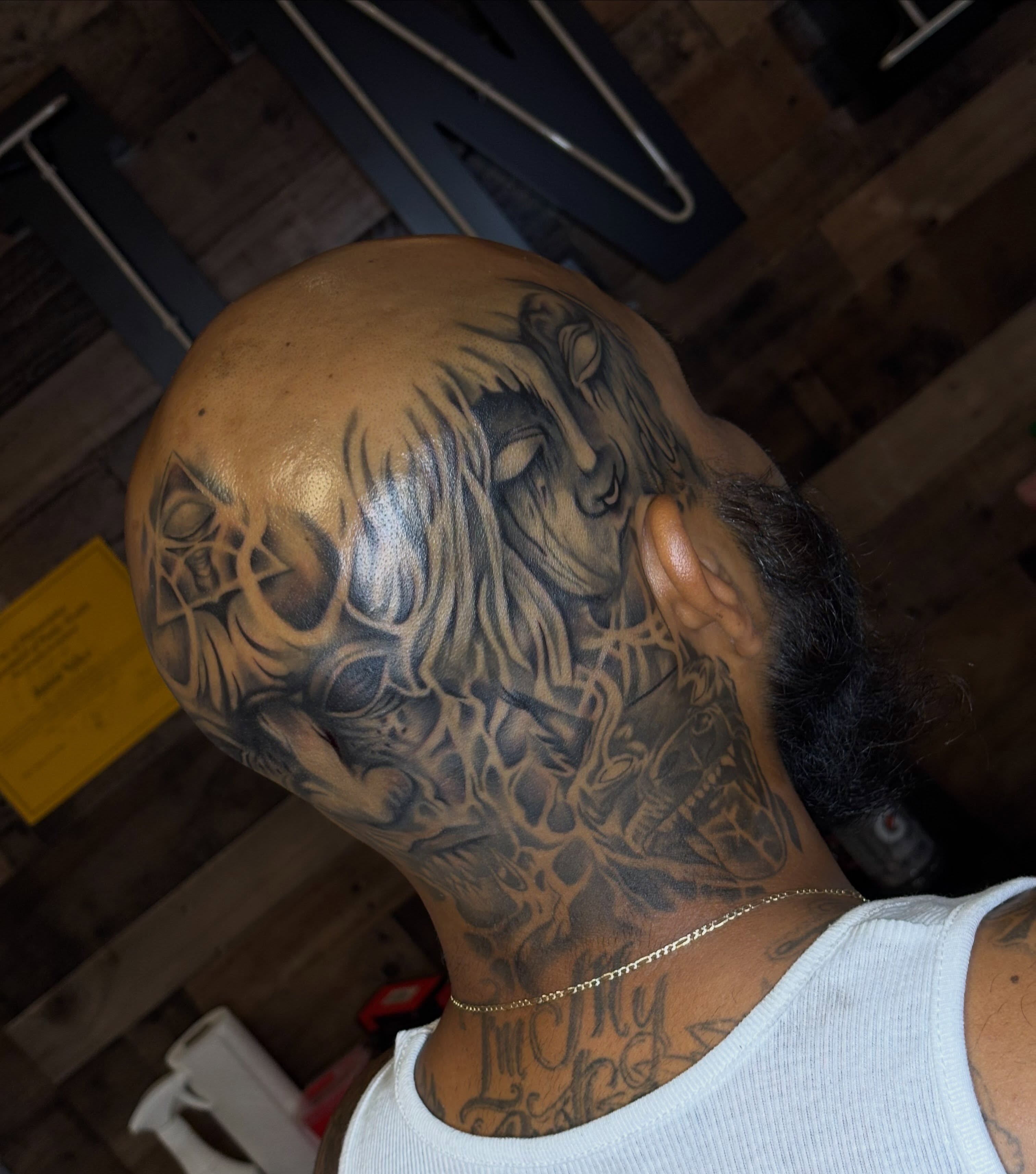 Lion realism tattoo on the head by Jay Daartist