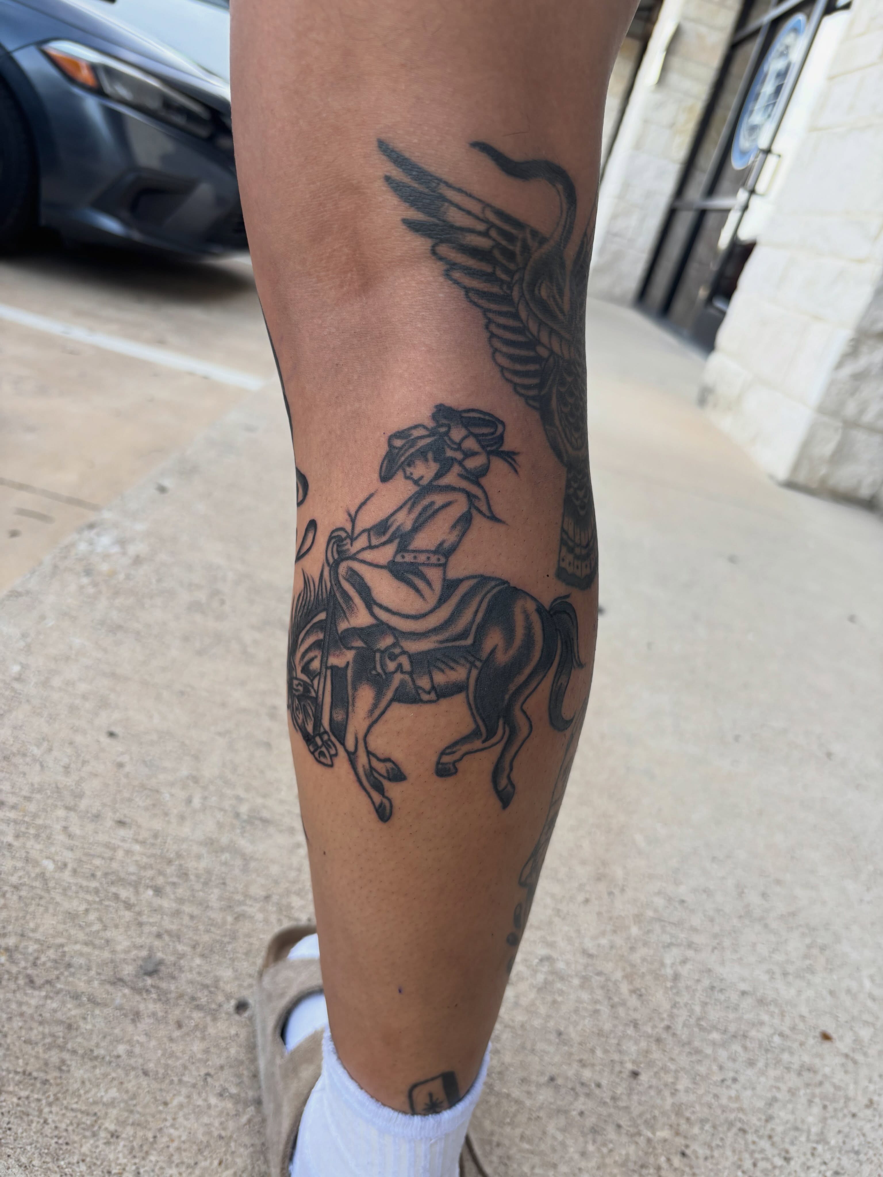 Horse rider black and grey tattoo on the forearm by Ethan Ellis, Dallas, Texas