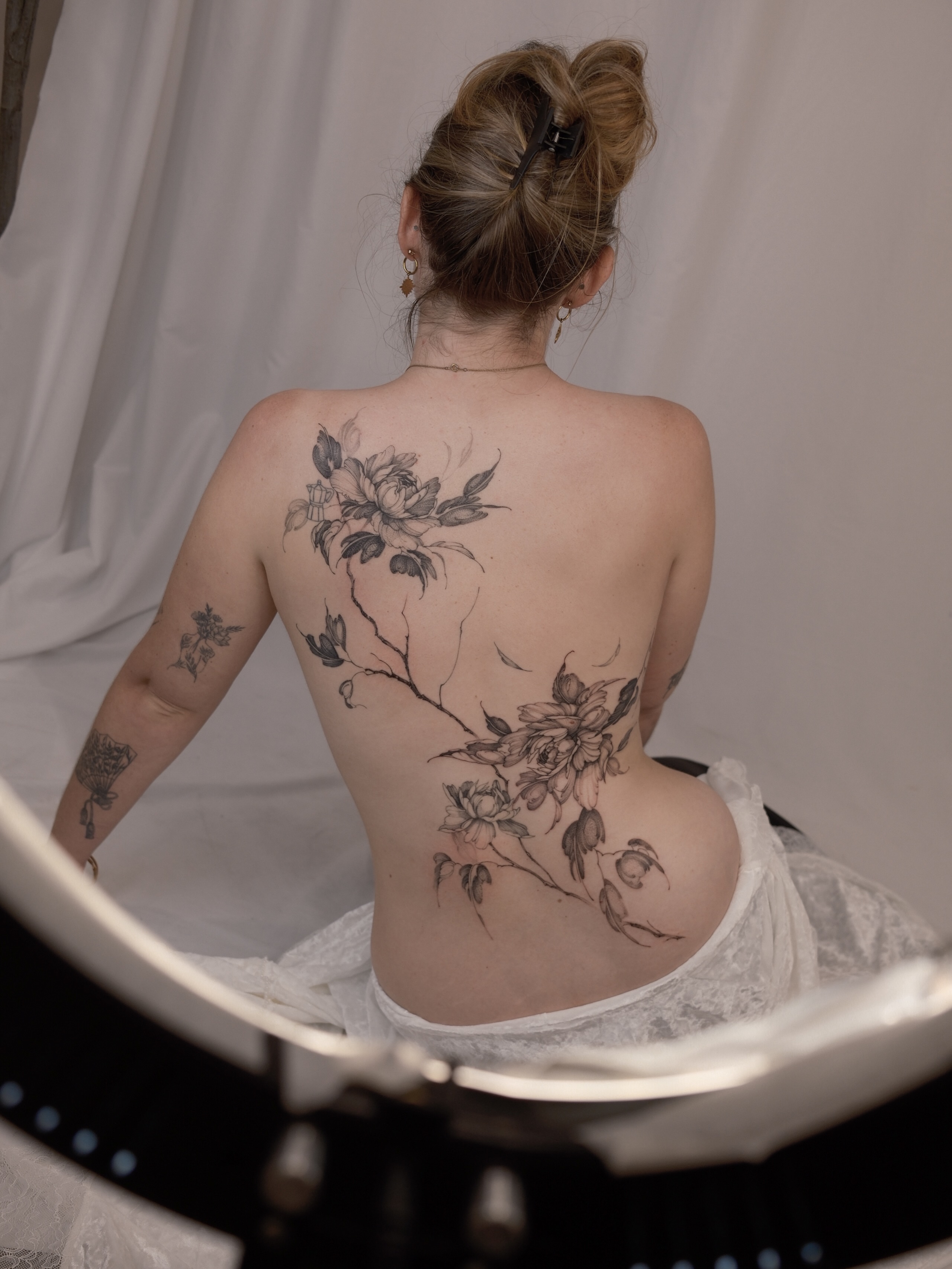 Floral design black and grey tattoo on the back by Joy, Gold Coast, Queensland