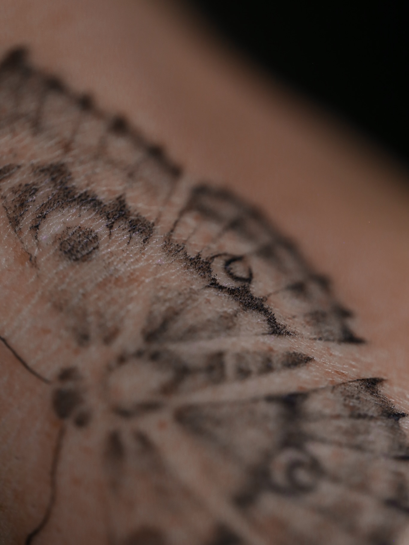 Geometric pattern geometric tattoo on the forearm by Inna Petrova, Kitchener, Ontario