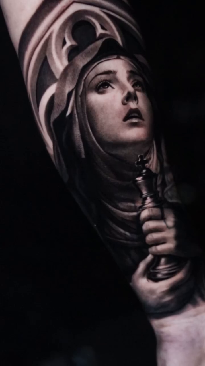 Woman holding a chess piece realism tattoo by Martin Reyes Jr