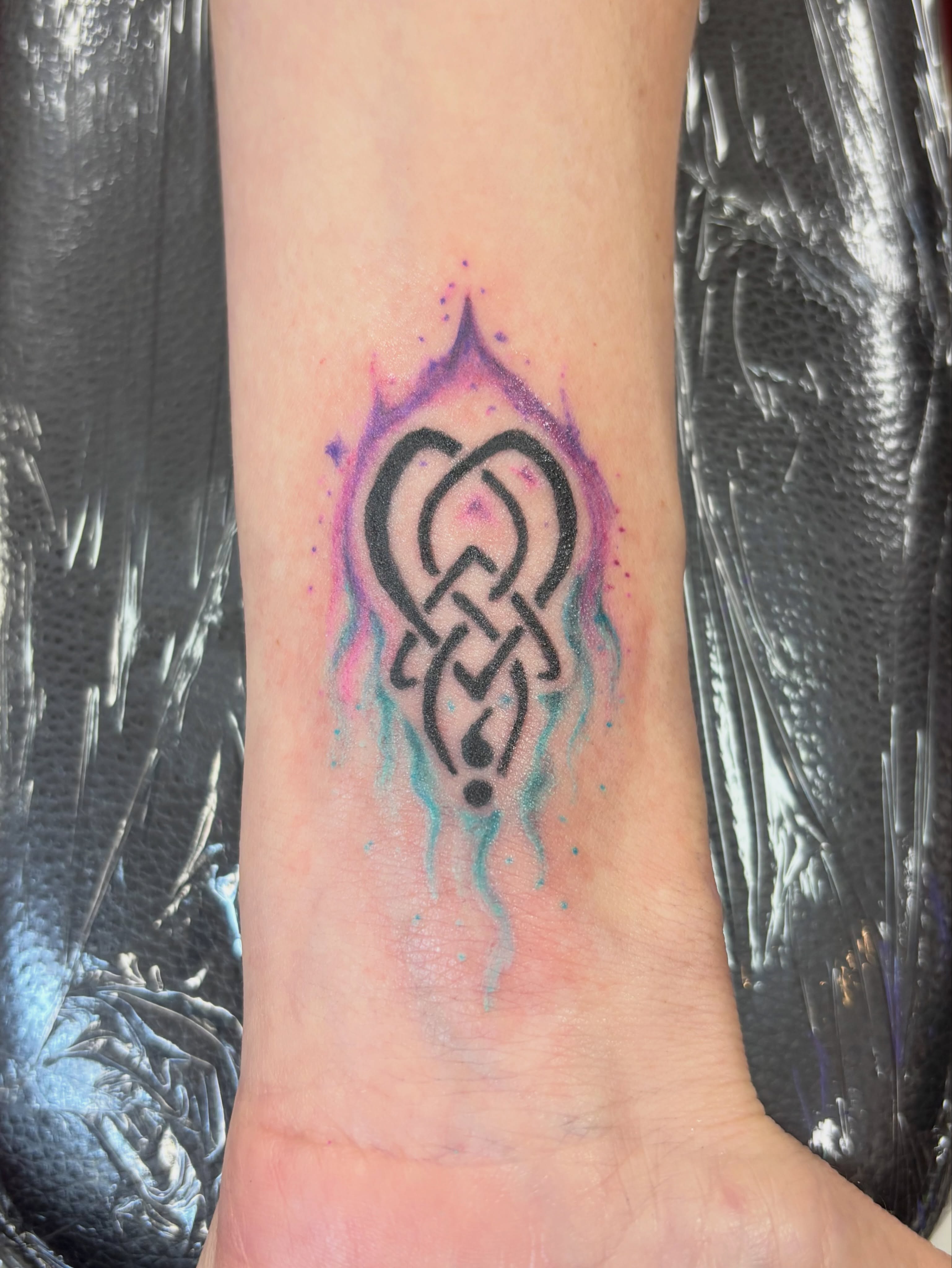 Knotwork watercolor tattoo on the foot by Thom Johns-Green