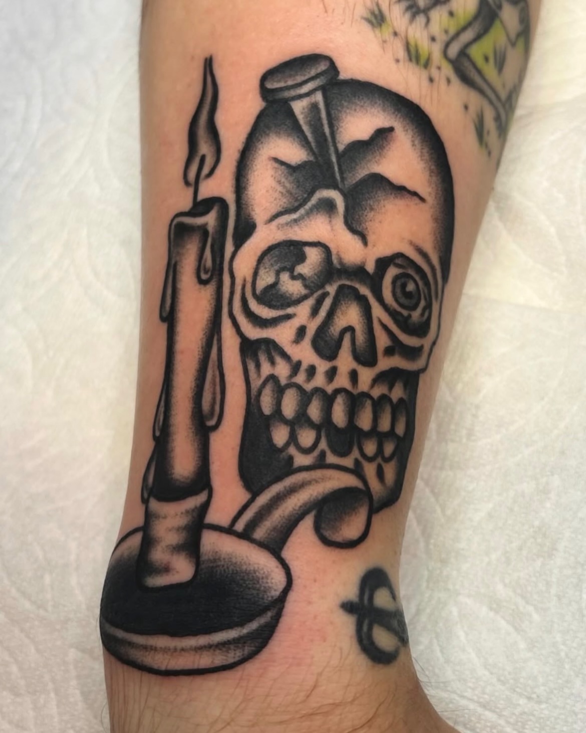 Skull and candle American traditional tattoo on the forearm by ๐๐๐ฏ๐ข๐ซ
