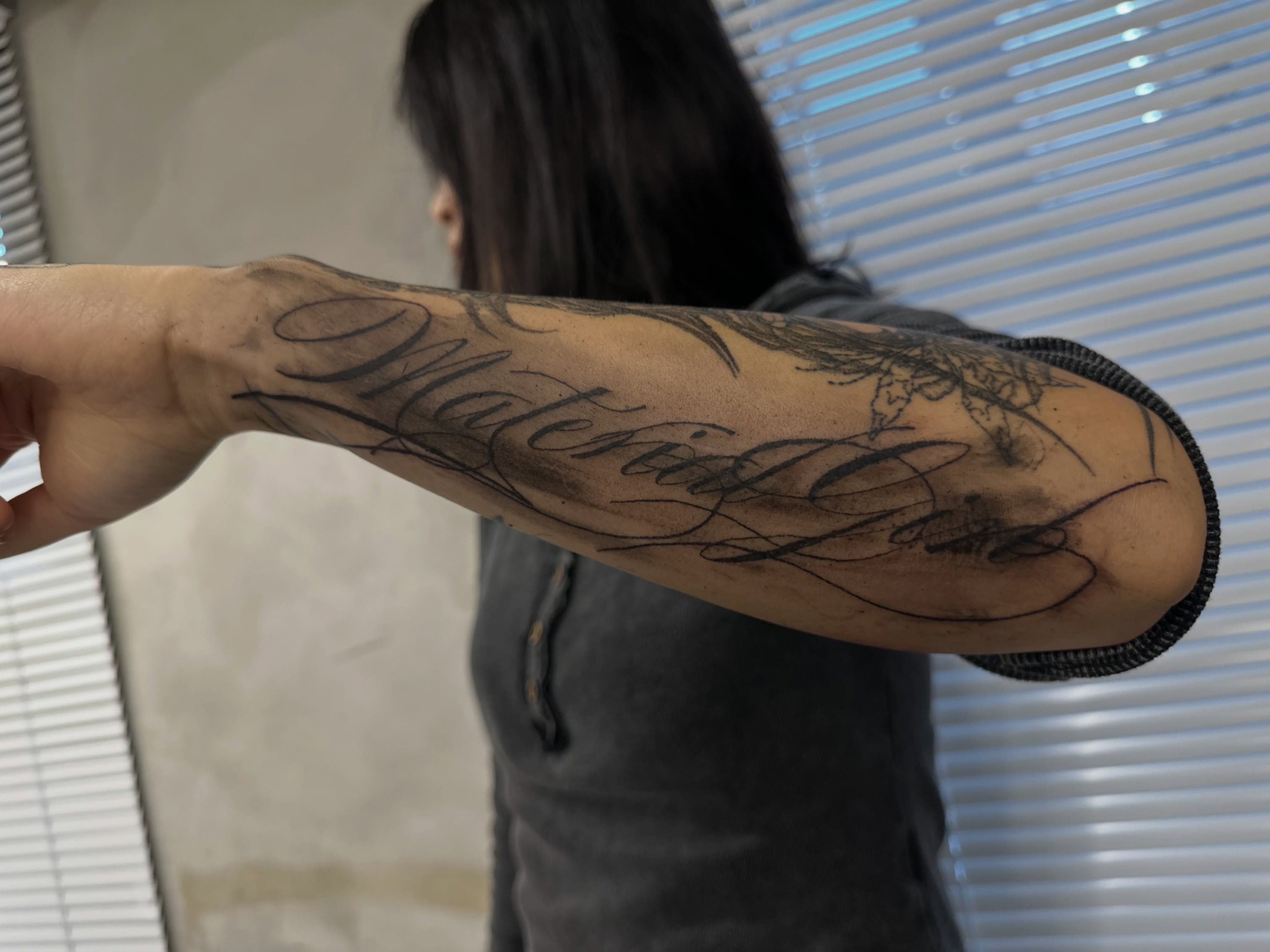 Script lettering lettering script tattoo on the forearm by eyeball
