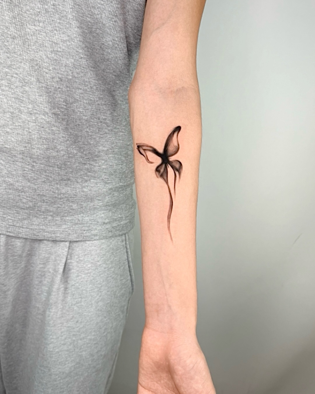 Tattoo by @tattooist_blanc — minimalist, watercolor
