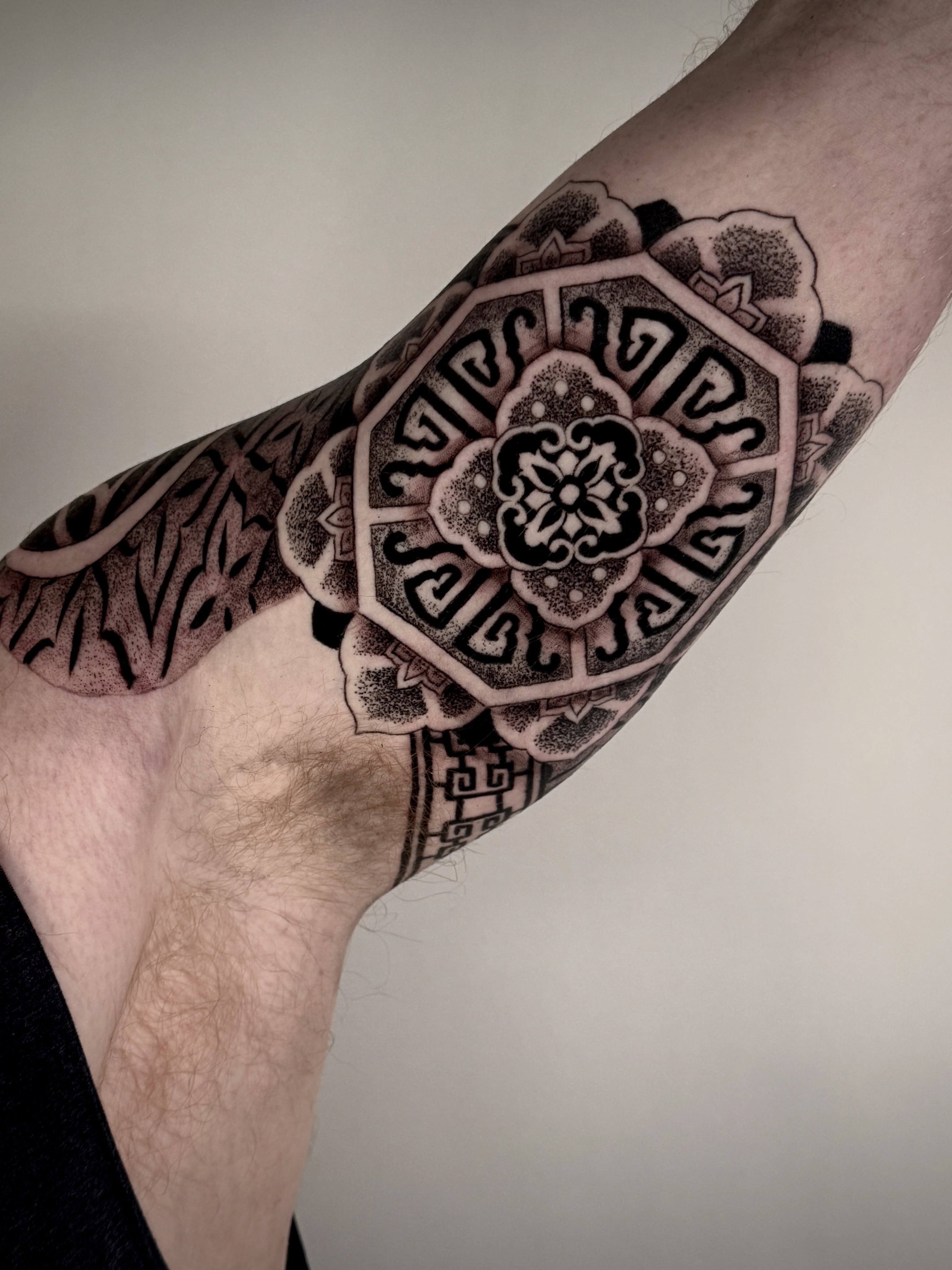 Mandala dotwork tattoo on the forearm by Christine Hendricks, Denver, Colorado