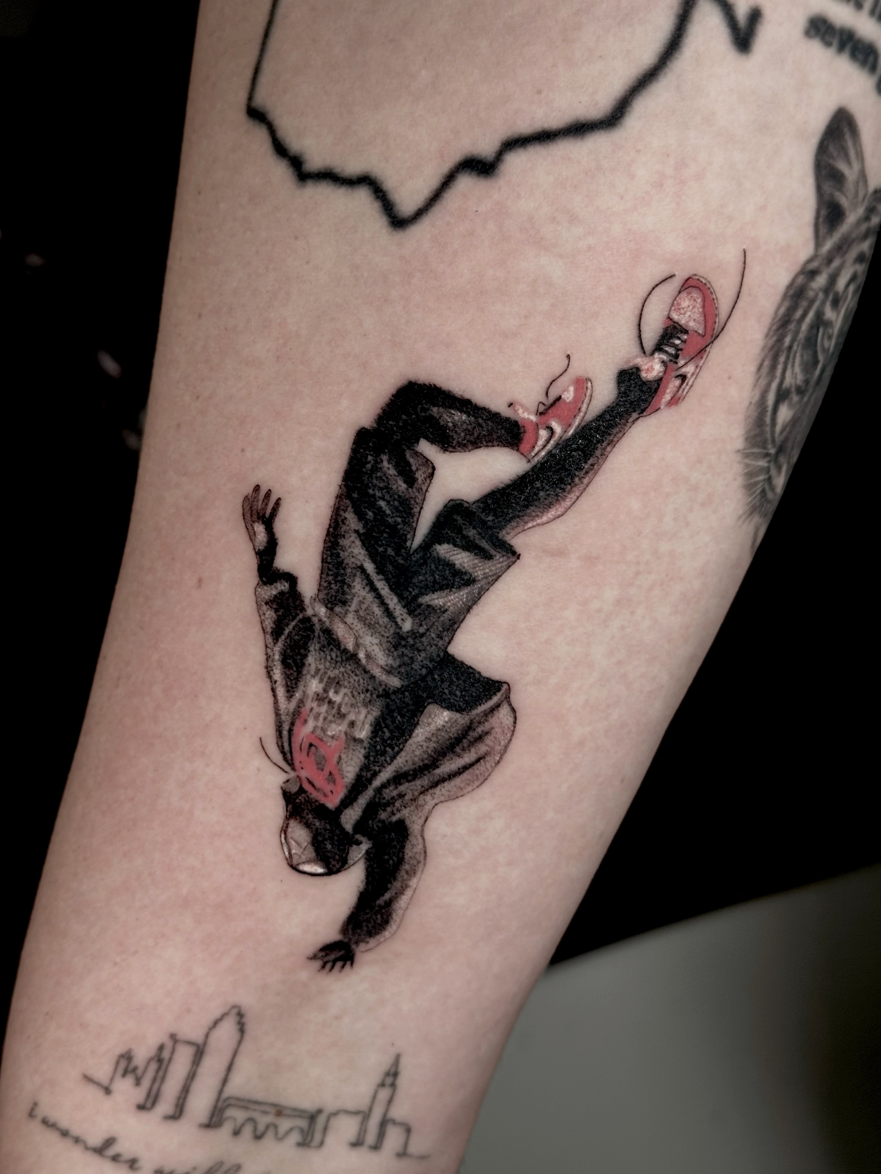 Skateboarder black and grey tattoo on the forearm by Fabian Hellberg