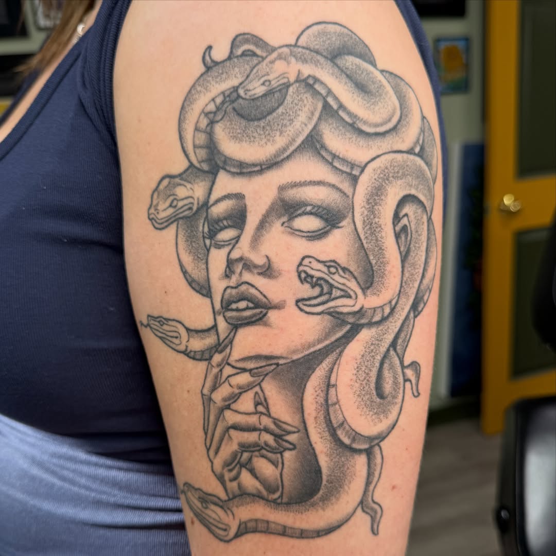 Medusa realism tattoo on the forearm by Joel Smith, Manhattan, Kansas