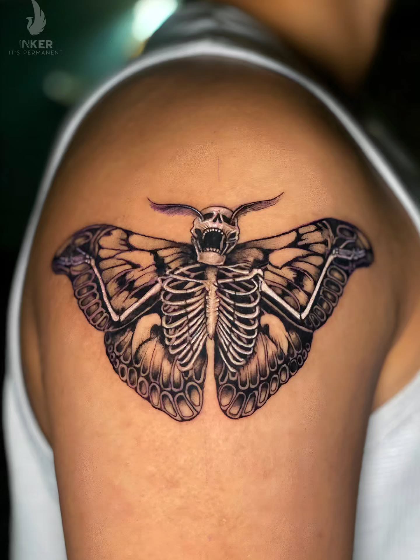 Moth skeleton dark realism tattoo on the shoulder by Shubhadeep Mukherjee