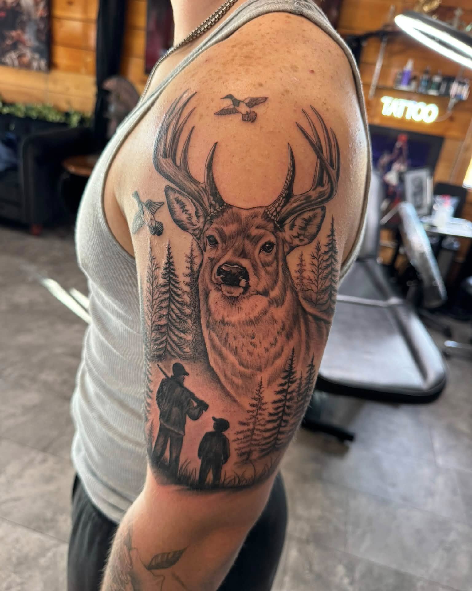 Tattoo by @justinrednourtattoo — realism, black_and_grey