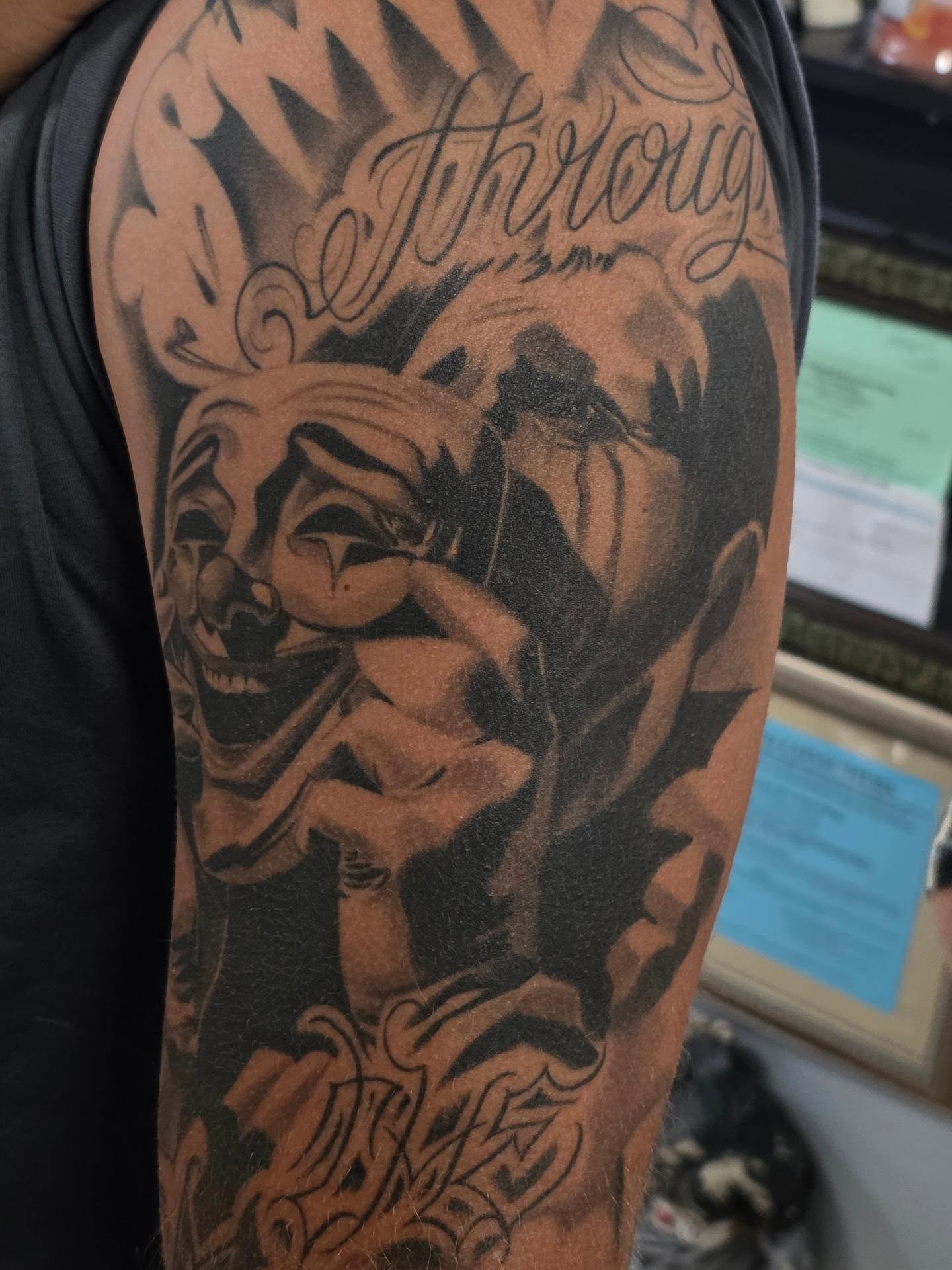 Clown face realism tattoo on the forearm by Tattoo Seez, Wichita, Kansas