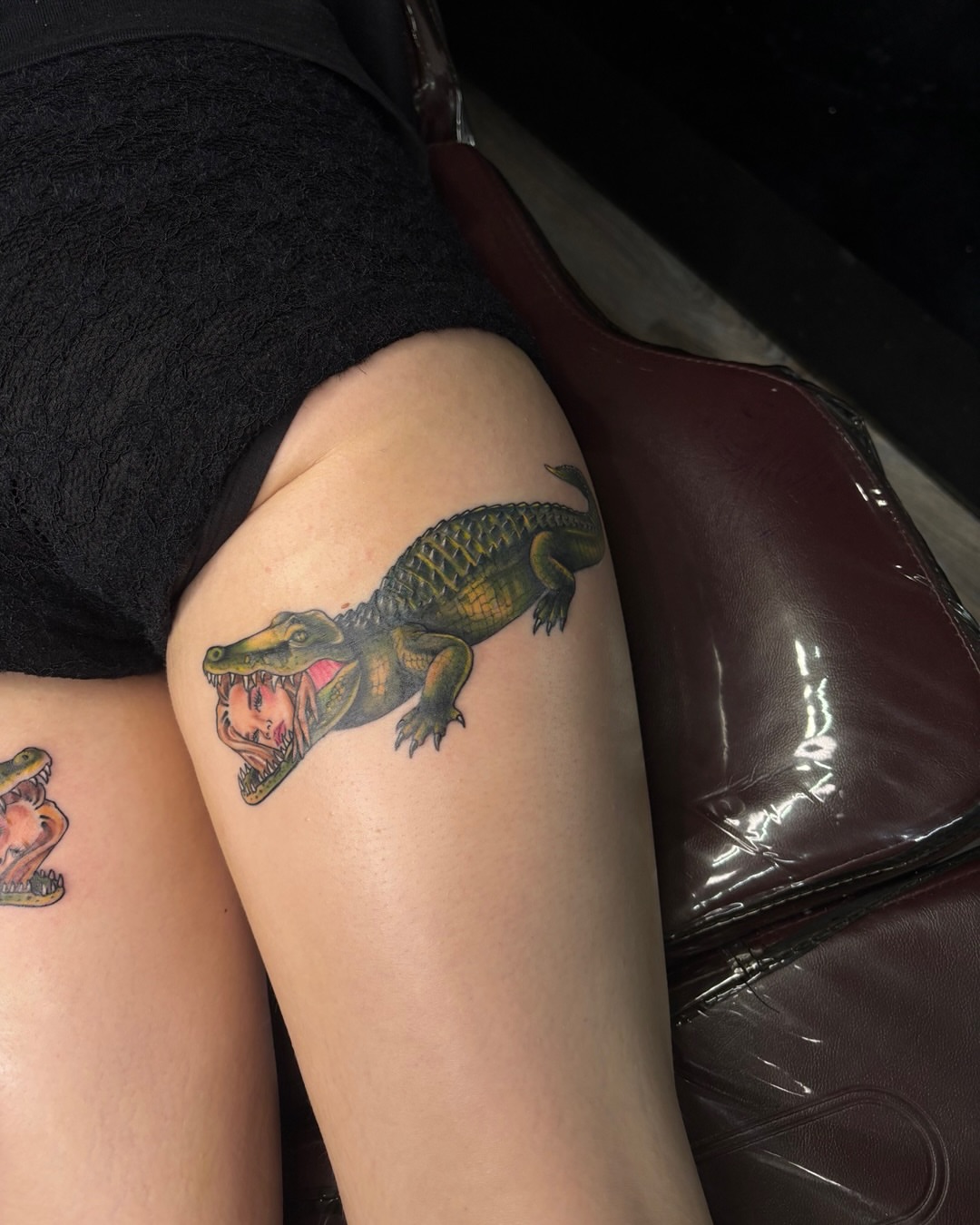 Alligator American traditional tattoo on the thigh by Shiann Null