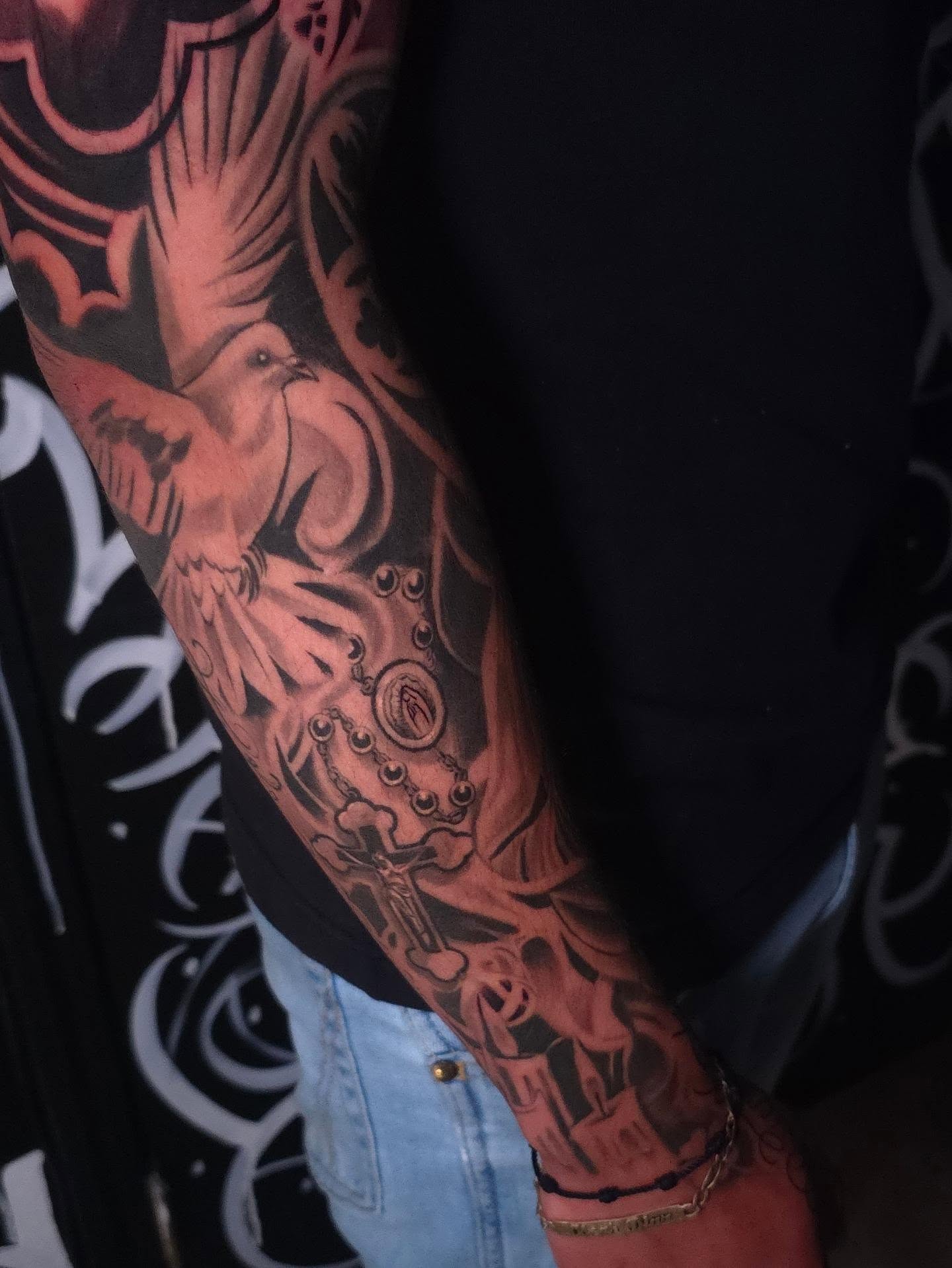 Bird and shield American traditional tattoo on the forearm by Tattoo Seez, Wichita, Kansas