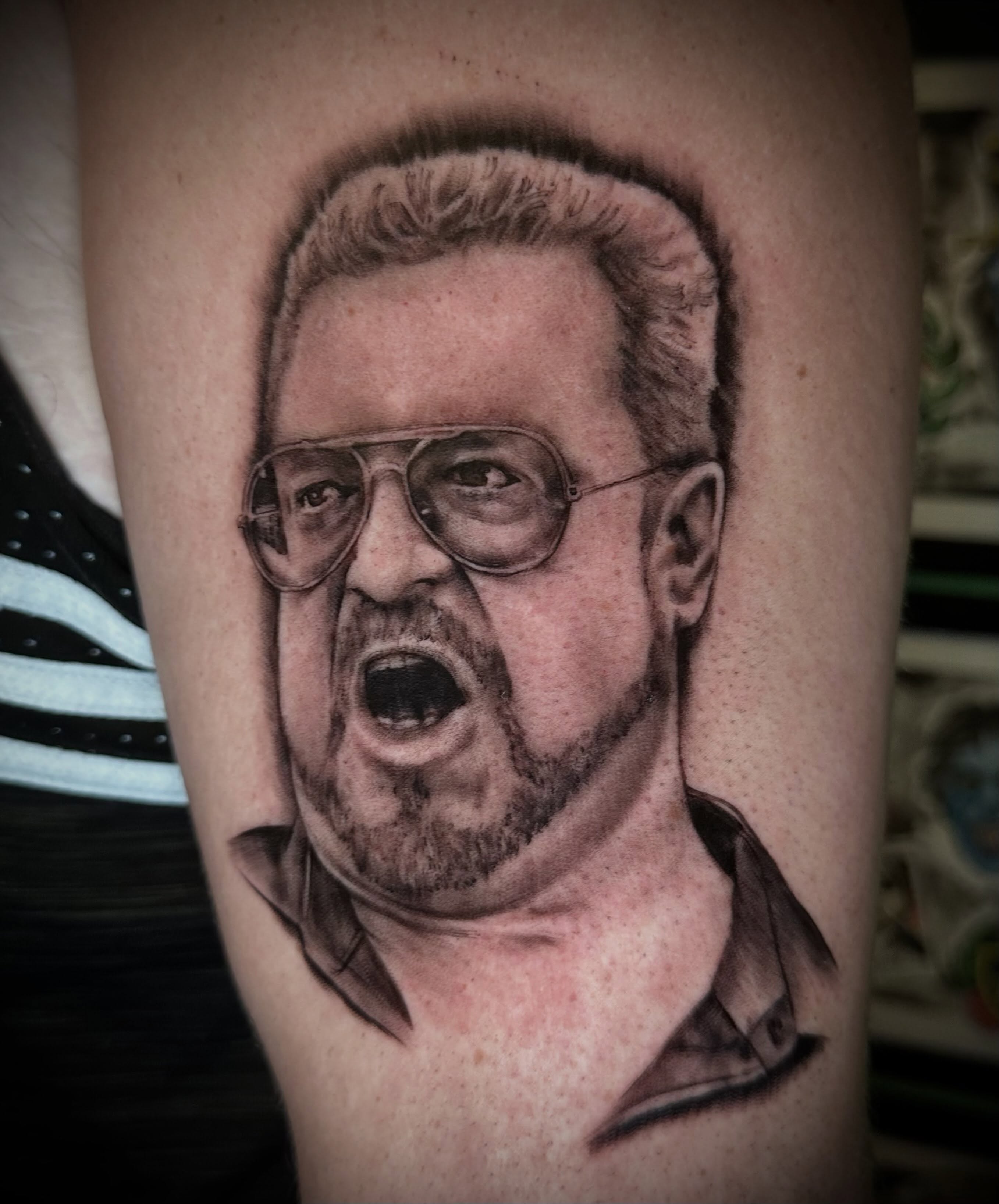 Portrait of a man realism tattoo on the forearm by Alan