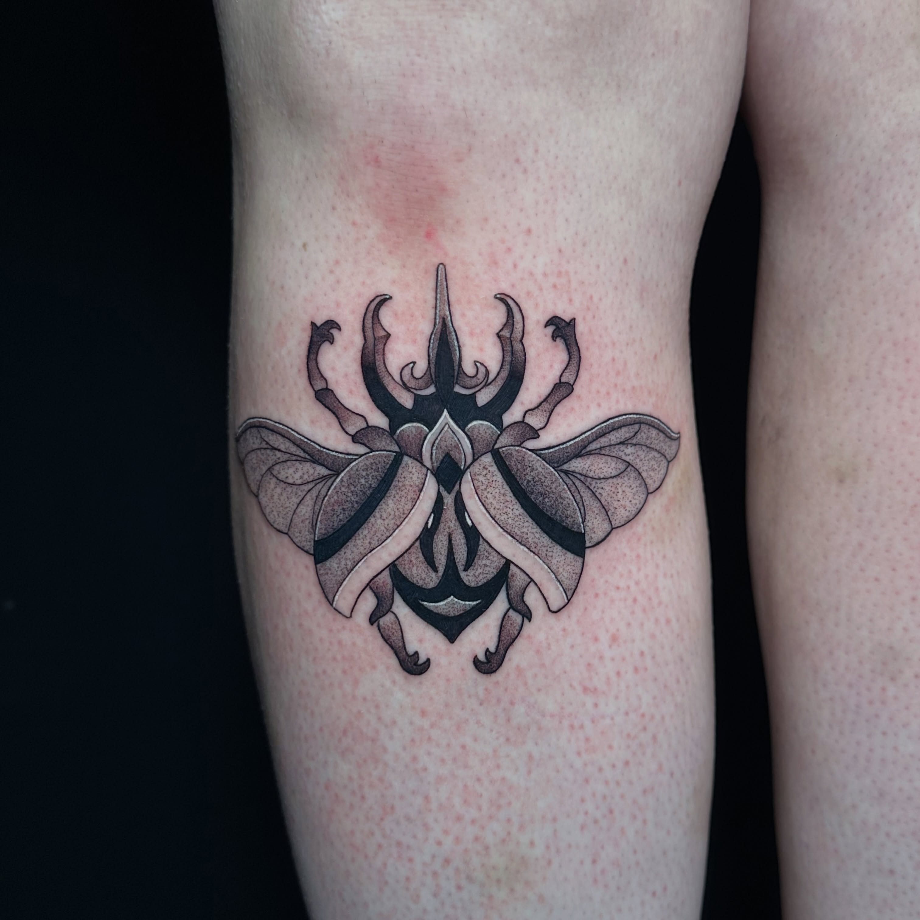 Insect dotwork tattoo on the thigh by Chi, Charlotte, North Carolina