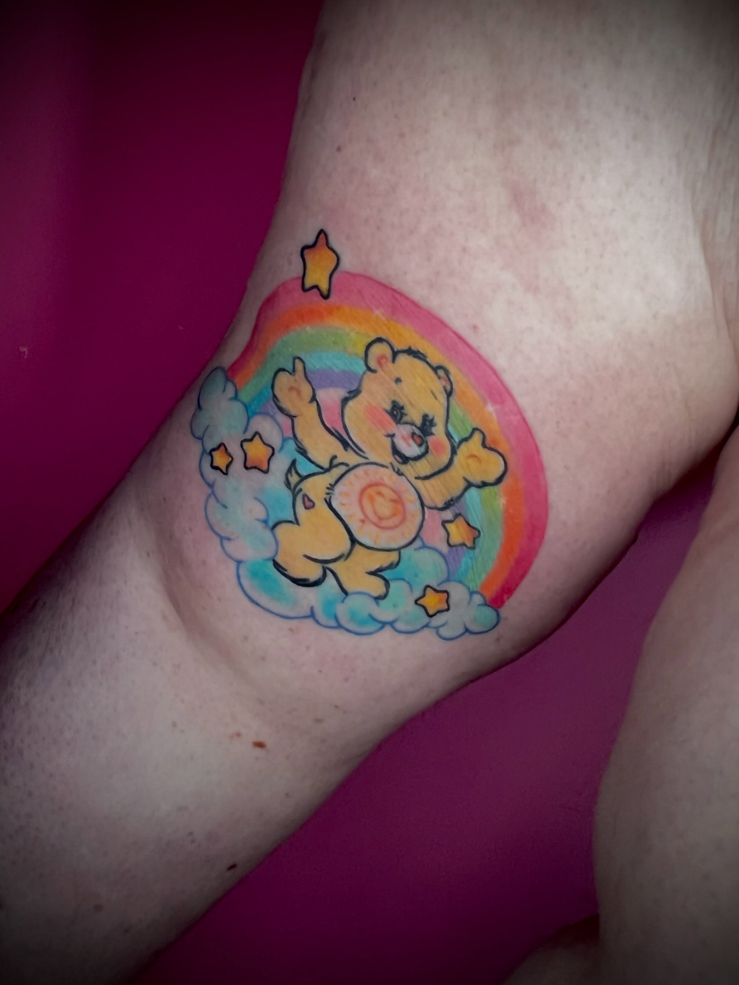 Care bear new school tattoo on the forearm by jessica valentine