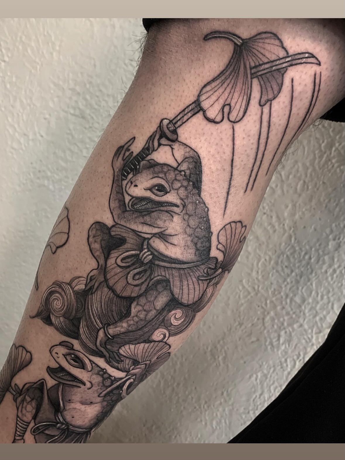 Fish and sword realism tattoo on the forearm by Javier Rivera