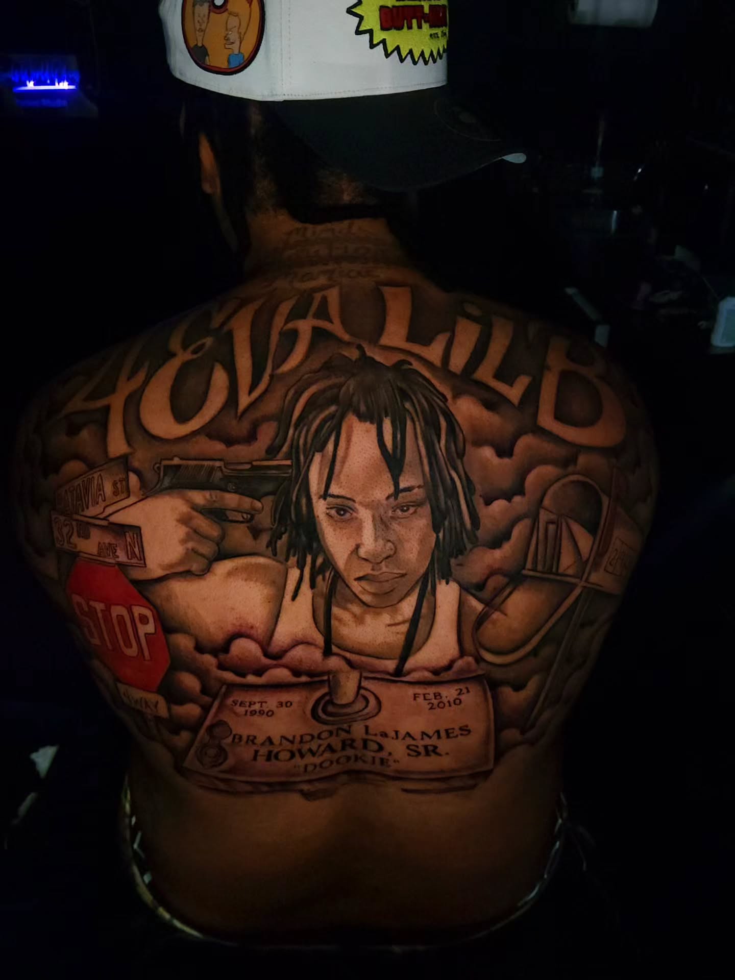 Portrait of a person realism tattoo on the back by 🗣 No Minors🔞‼️‼️‼️