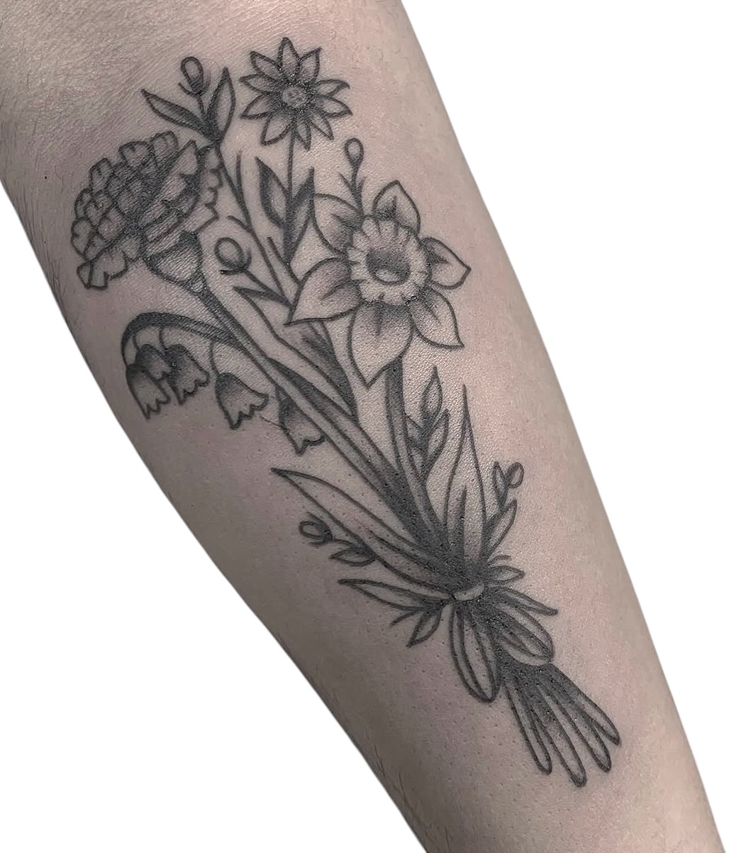Floral bouquet black and grey tattoo on the forearm by Chris Martin