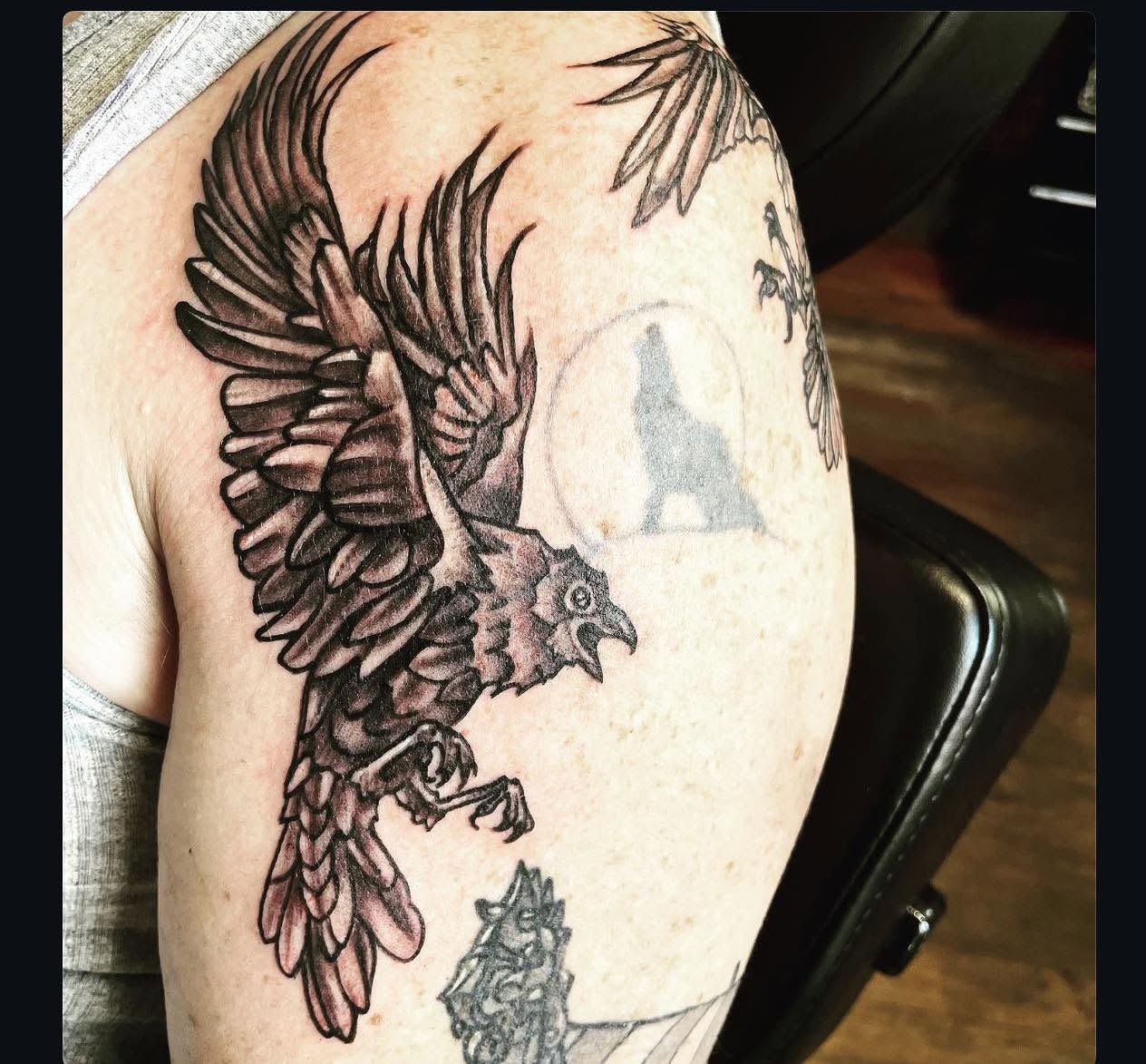 Raven black and grey tattoo on the shoulder by Josh O’ + Bird ☘️ 🪶