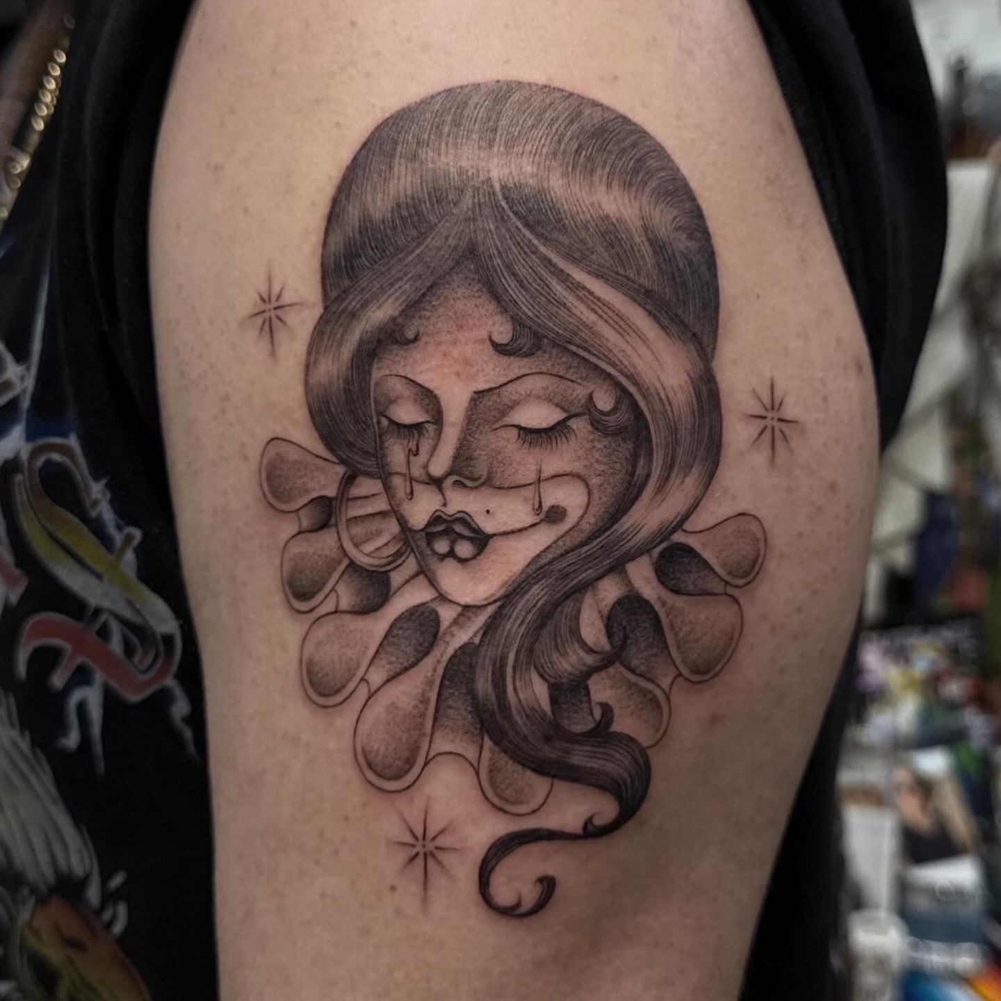 Woman with long hair realism tattoo on the shoulder by H e I D I