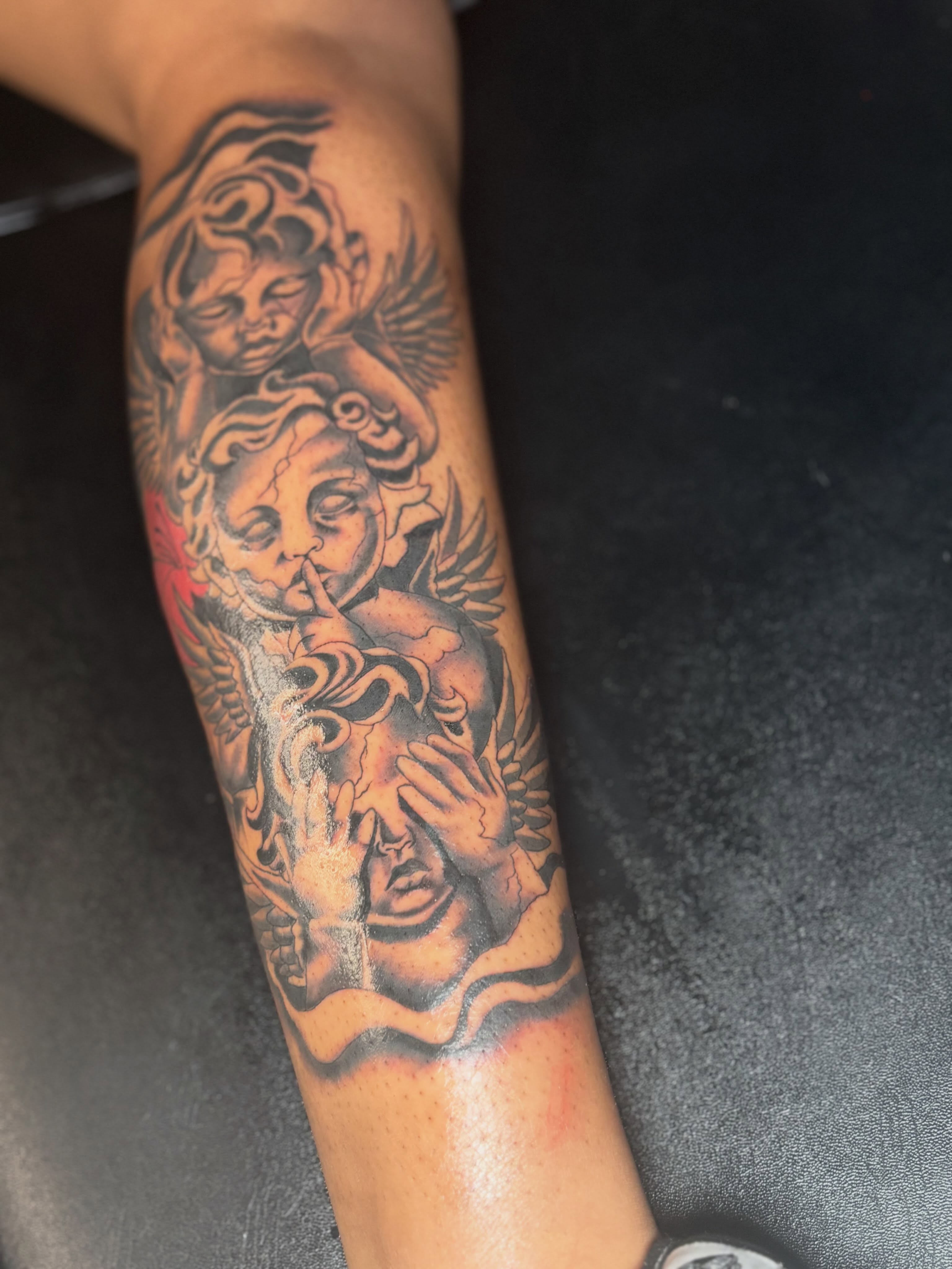 Cherubs American traditional tattoo on the forearm by Mr.K