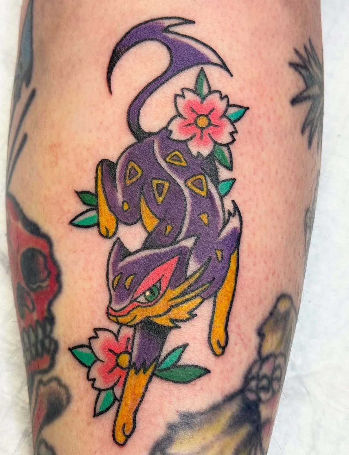 Chameleon American traditional tattoo on the forearm by Kelsey Turnis