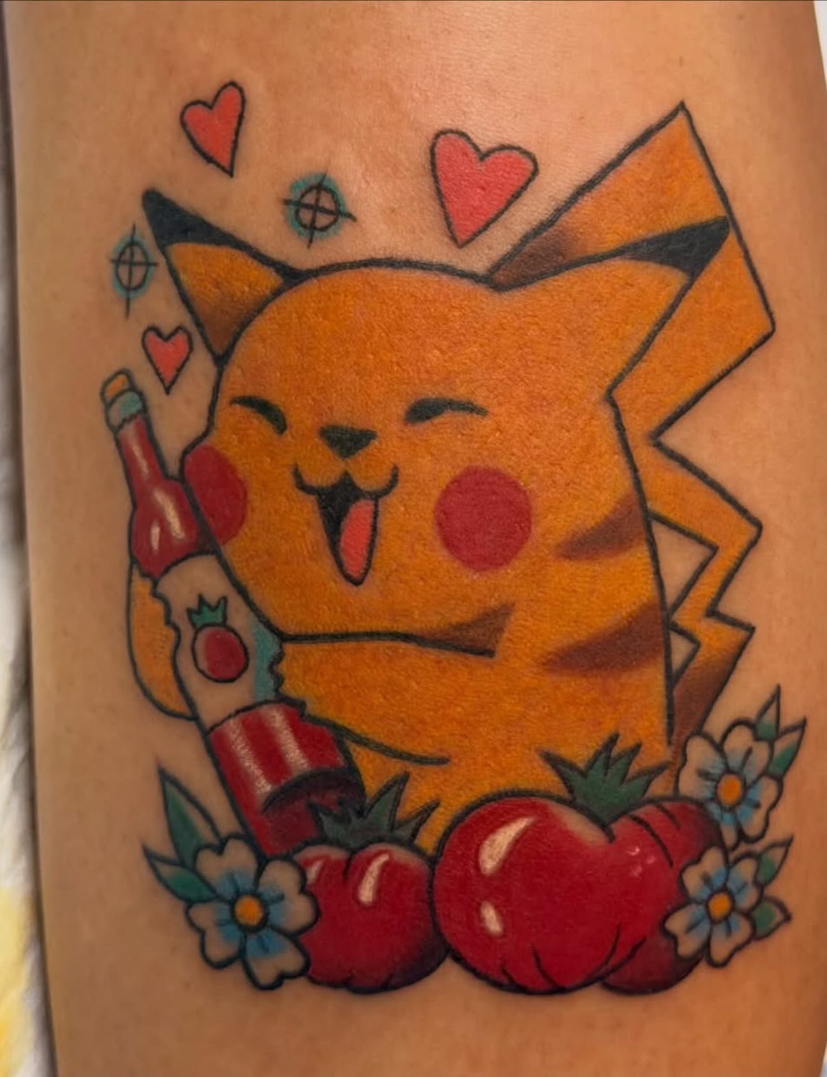 Pikachu American traditional tattoo on the forearm by Kelsey Turnis