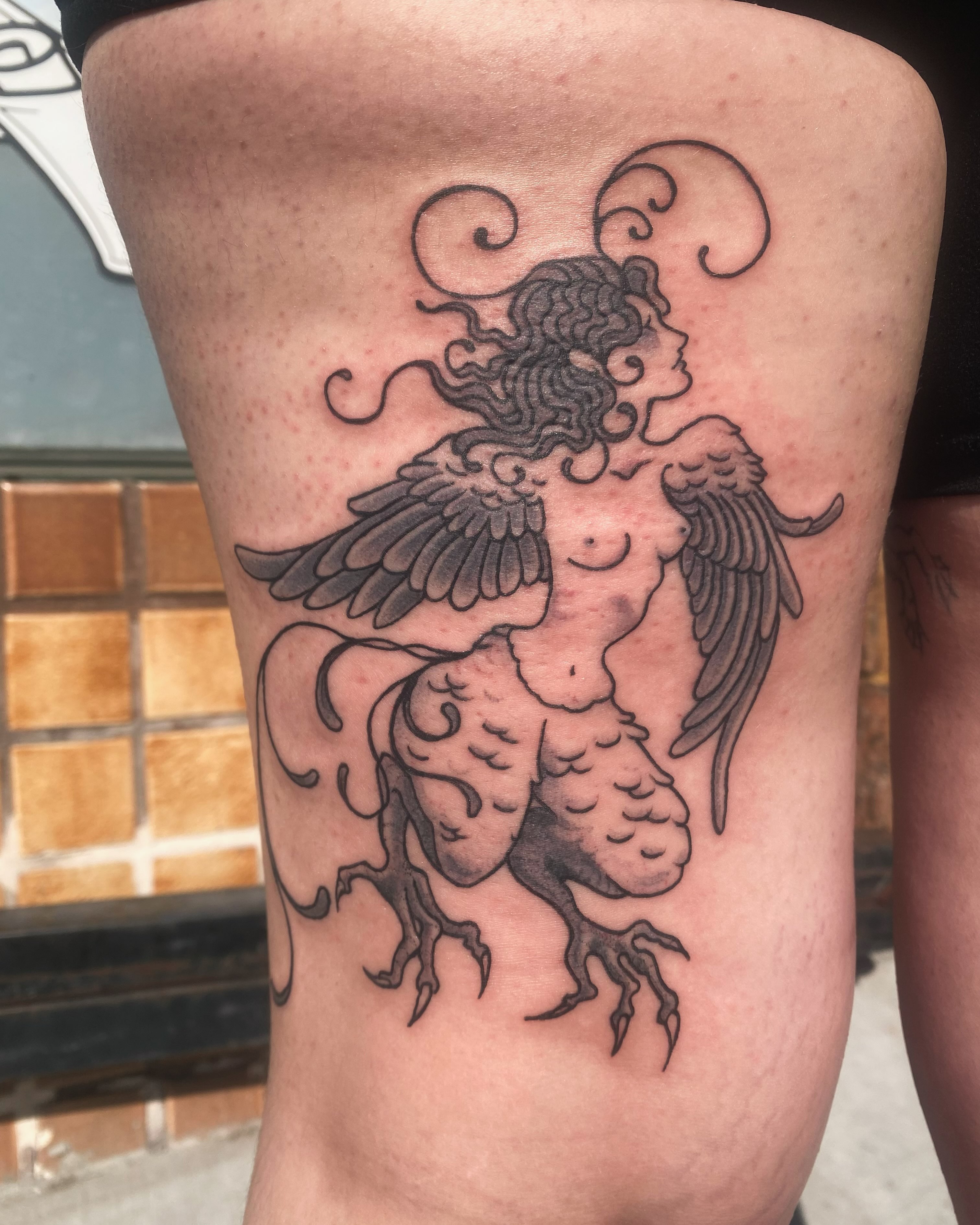 Phoenix black and grey tattoo on the thigh by sarah 🗝️