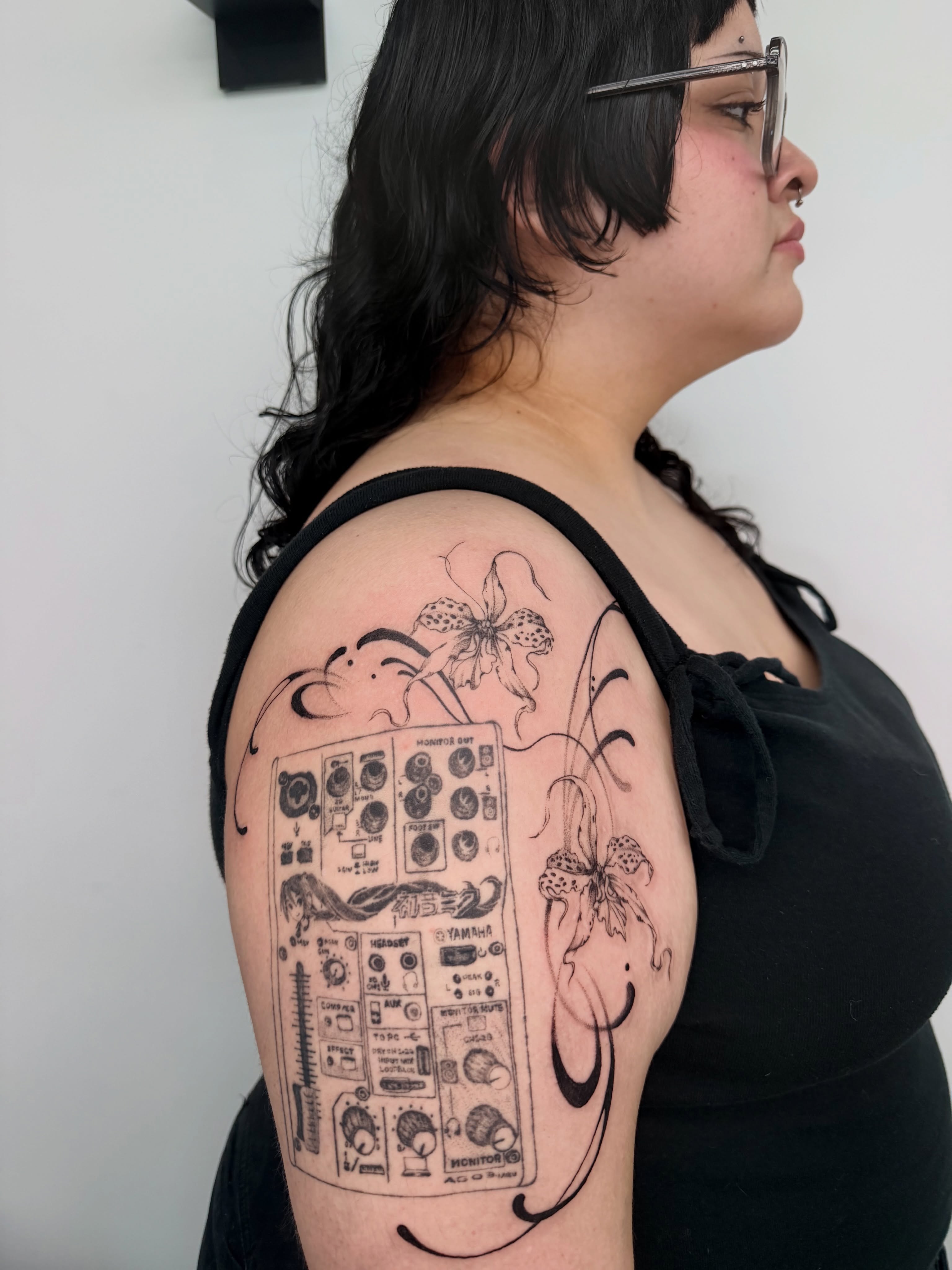 Music control panel black and grey tattoo on the shoulder by bella :)