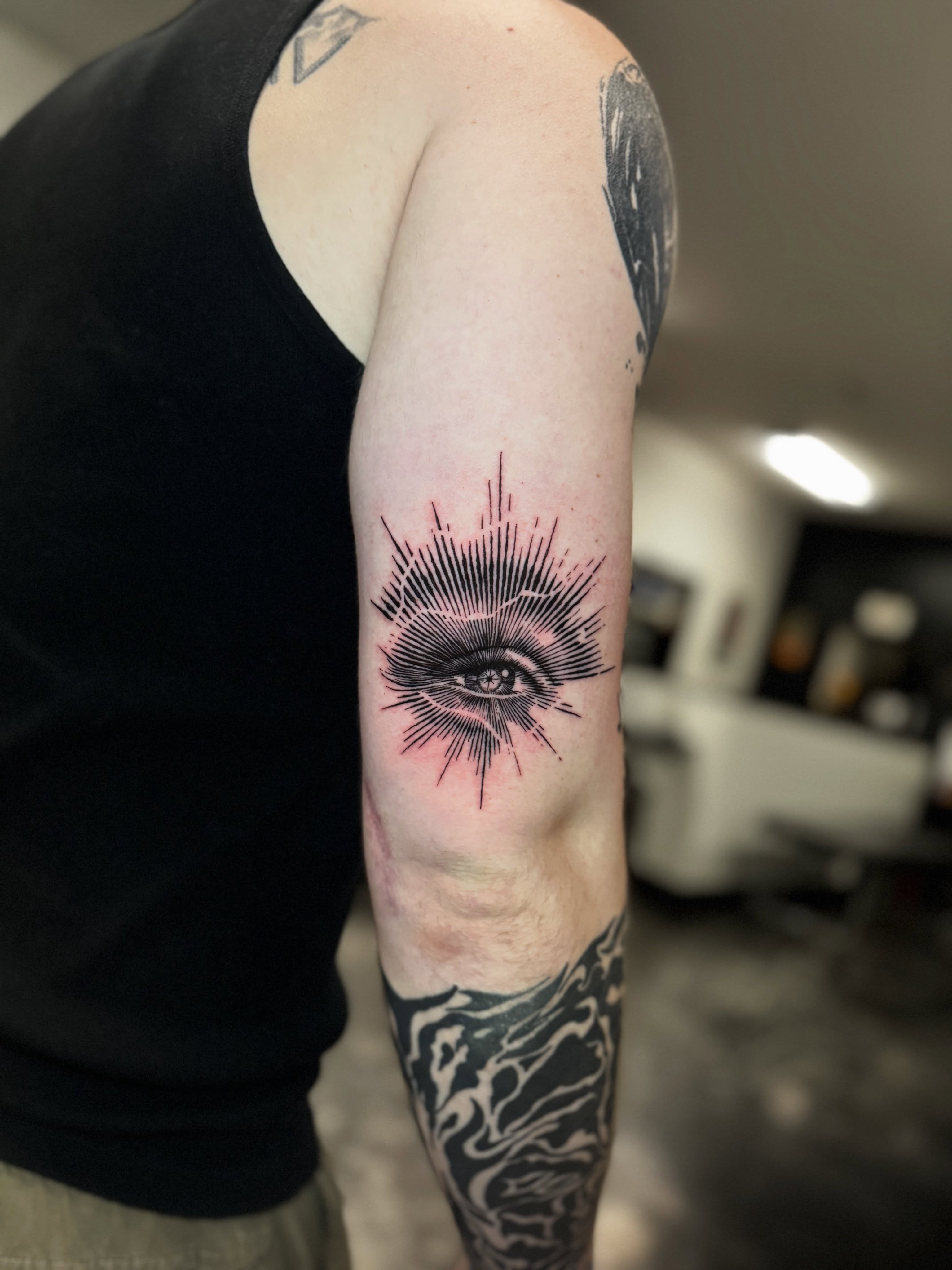 Eye realism tattoo on the forearm by Paola Pineda Tattoo, Knoxville, Tennessee