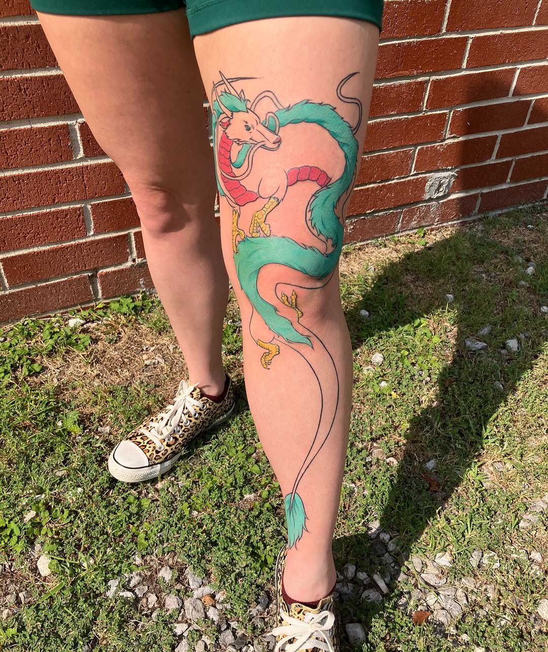 Dragon new school tattoo on the thigh by maddie mcghee, Memphis, Tennessee