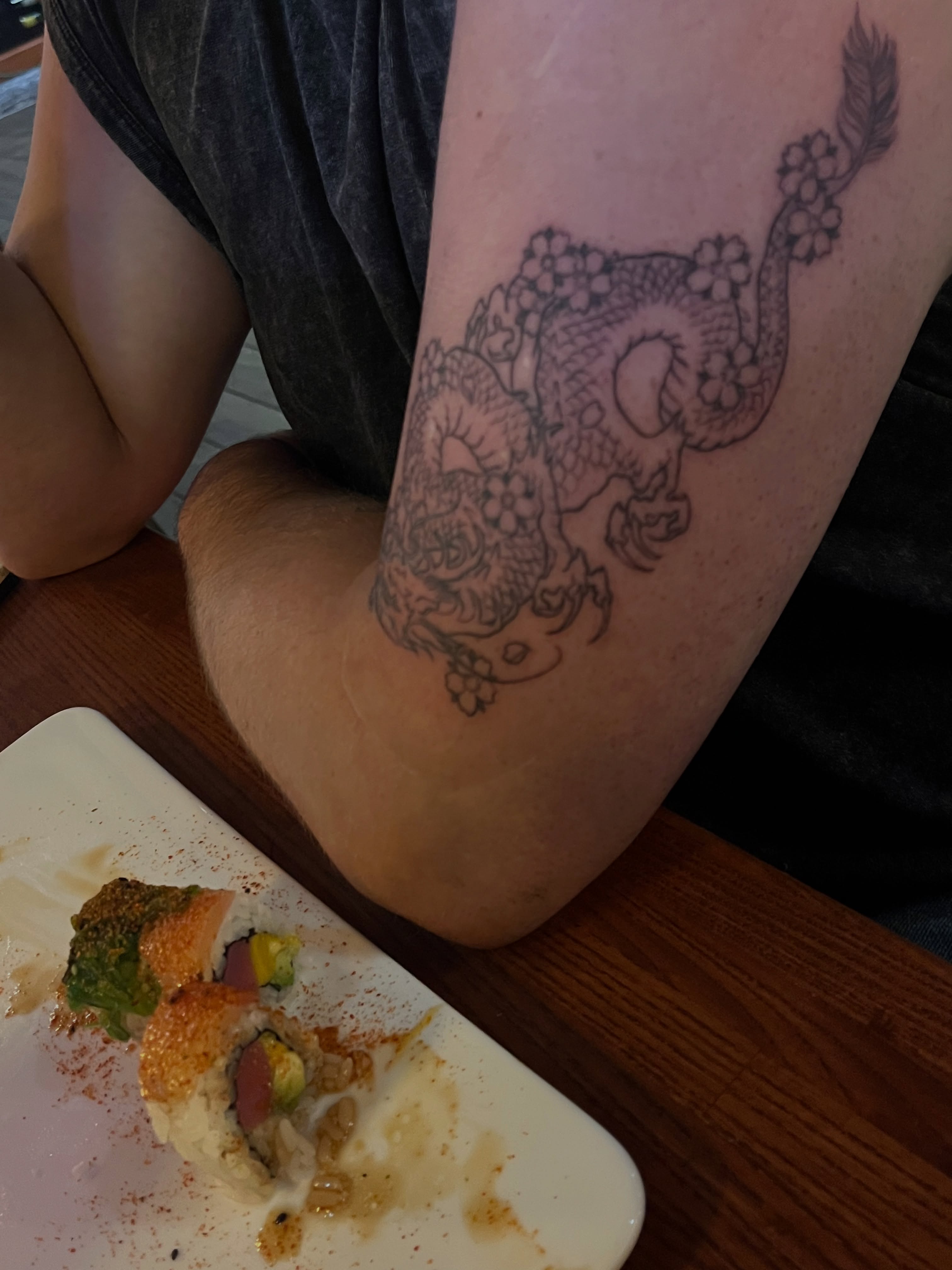 Dragon black and grey tattoo on the forearm by Zoe Phan, Richmond, Virginia