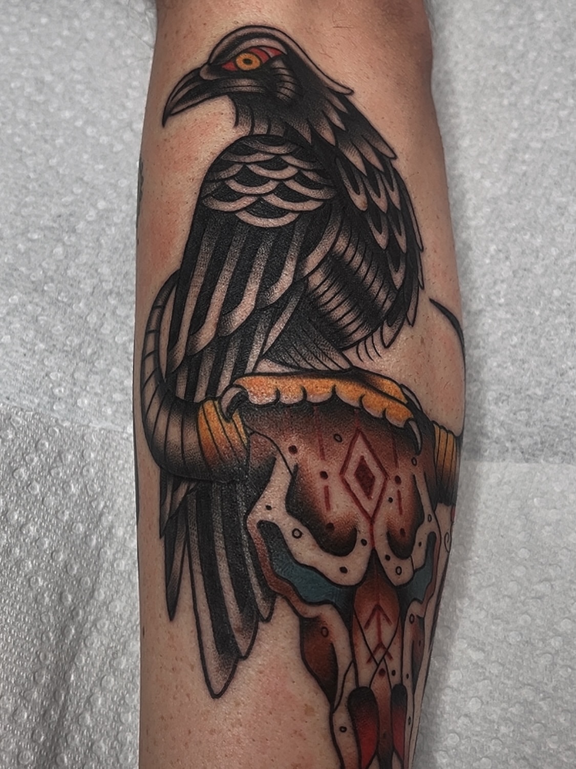 Crow American traditional tattoo on the forearm by Las Vegas Tattoo Artist