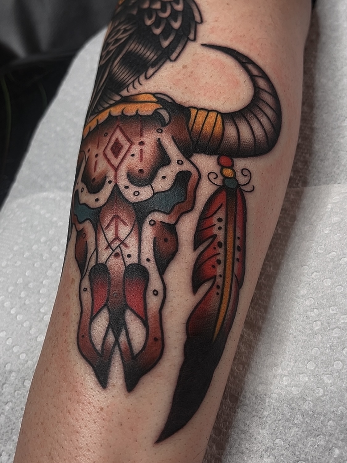 Bull skull American traditional tattoo on the forearm by Las Vegas Tattoo Artist
