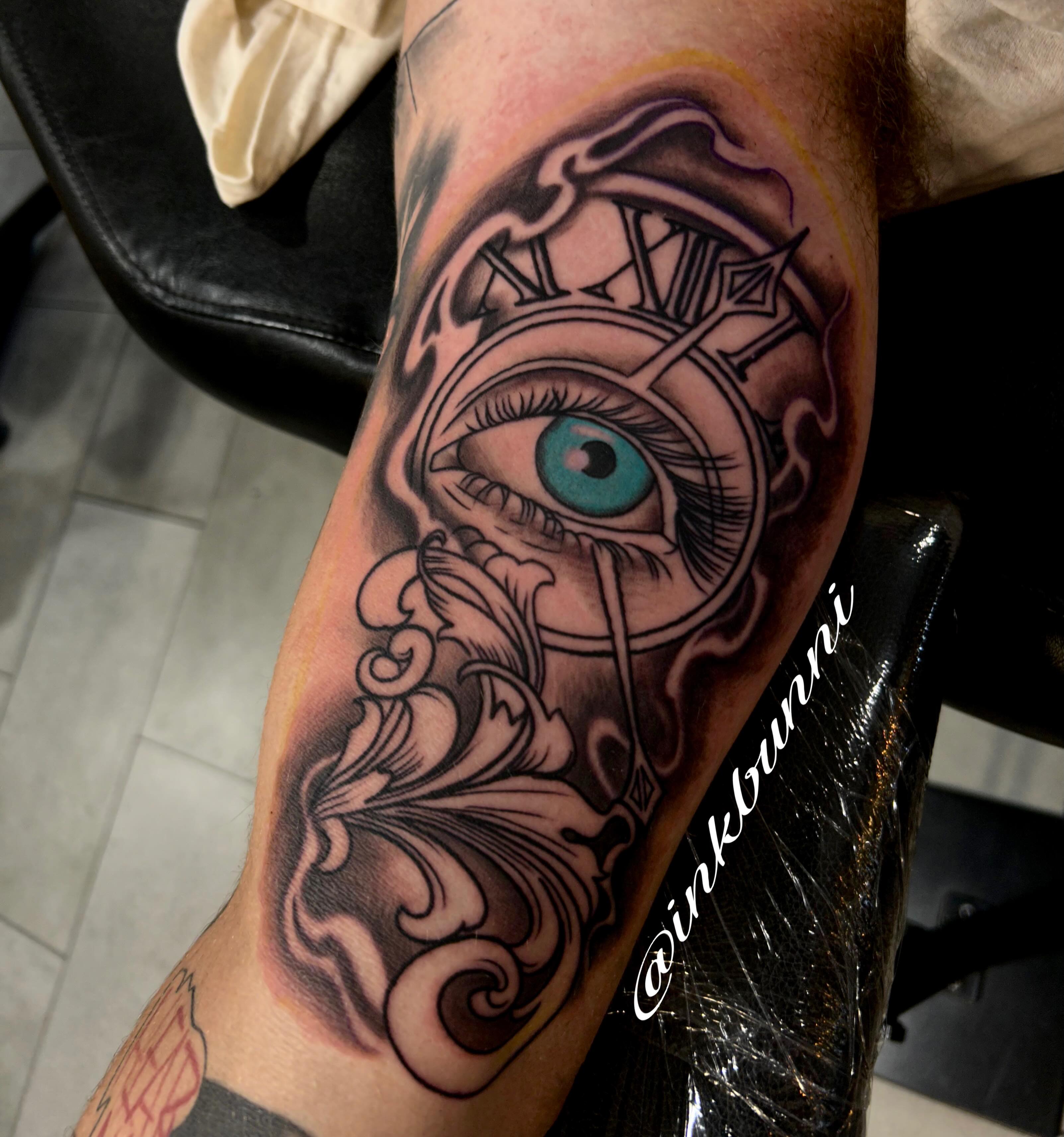 Eye and clock black and grey tattoo on the forearm by Hailey Aka inkbunni, Detroit, Michigan