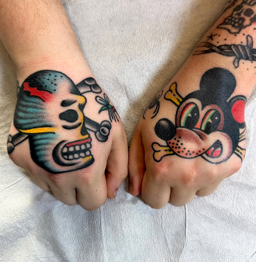 Skull and dog American traditional tattoo on the hand by David Devaney, Knoxville, Tennessee