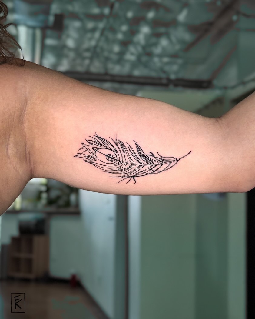 Peacock feather fine line tattoo on the forearm by elizaveta
