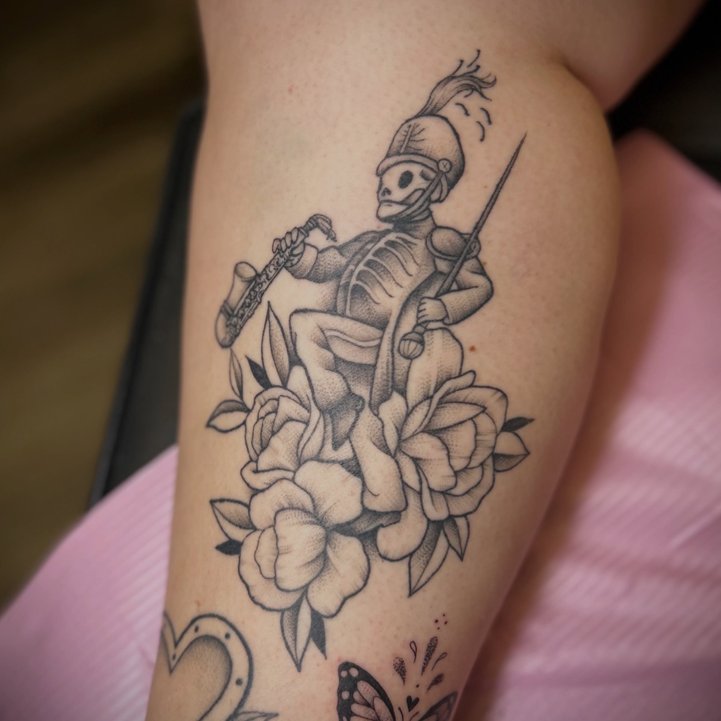 Skeleton playing saxophone American traditional tattoo on the forearm by Browtique & Ink, Clearwater, Florida