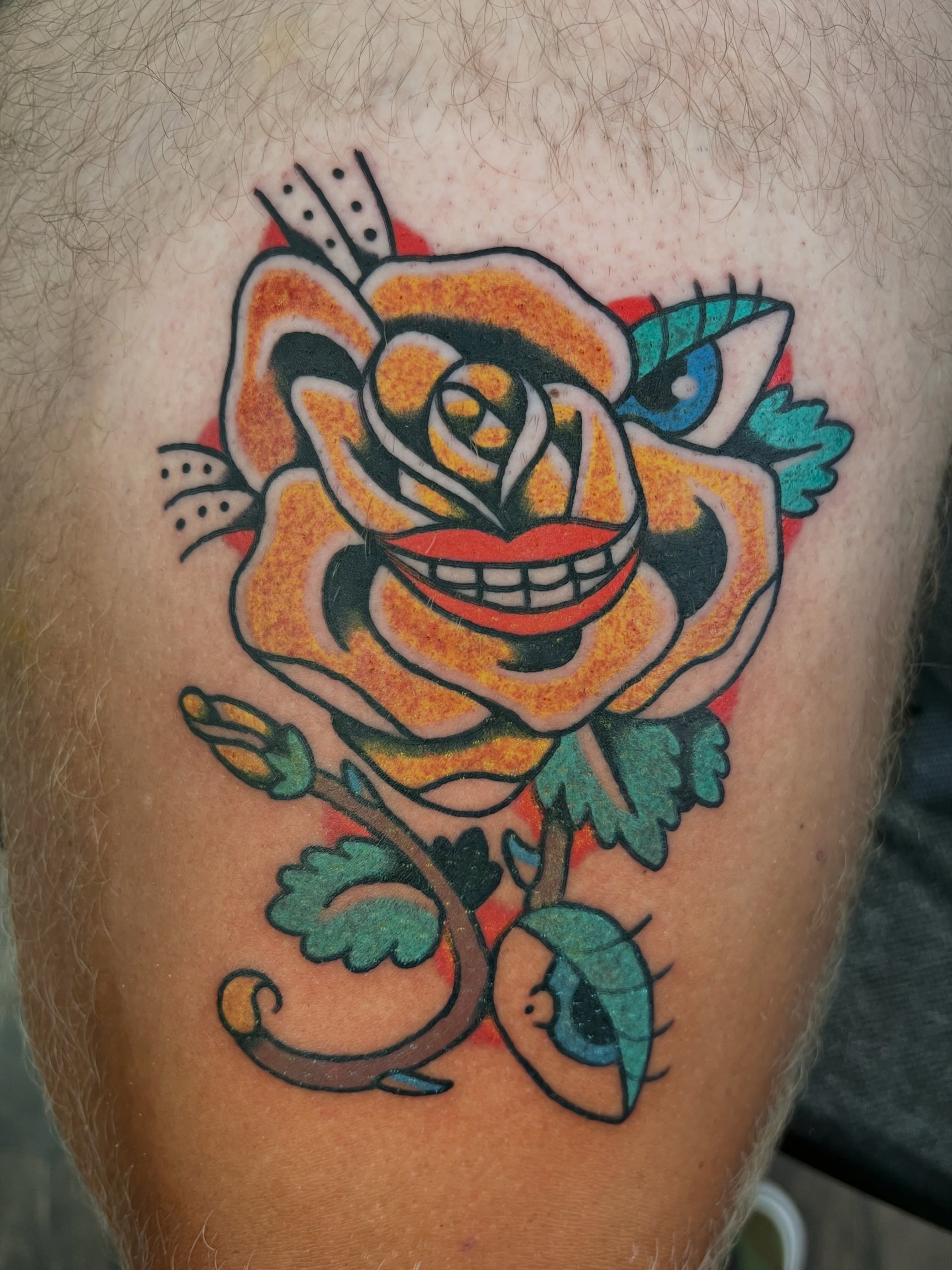 Smiling rose American traditional tattoo on the thigh by 🍊Harvey Perez 🍊, Deerfield Beach, Florida