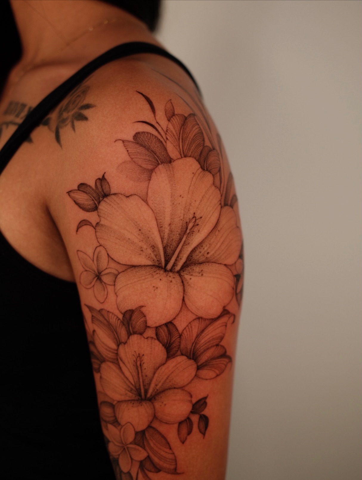 Floral bouquet black and grey tattoo on the shoulder by LORIE π€ Floral Tattoo Artist, Los Angeles, California