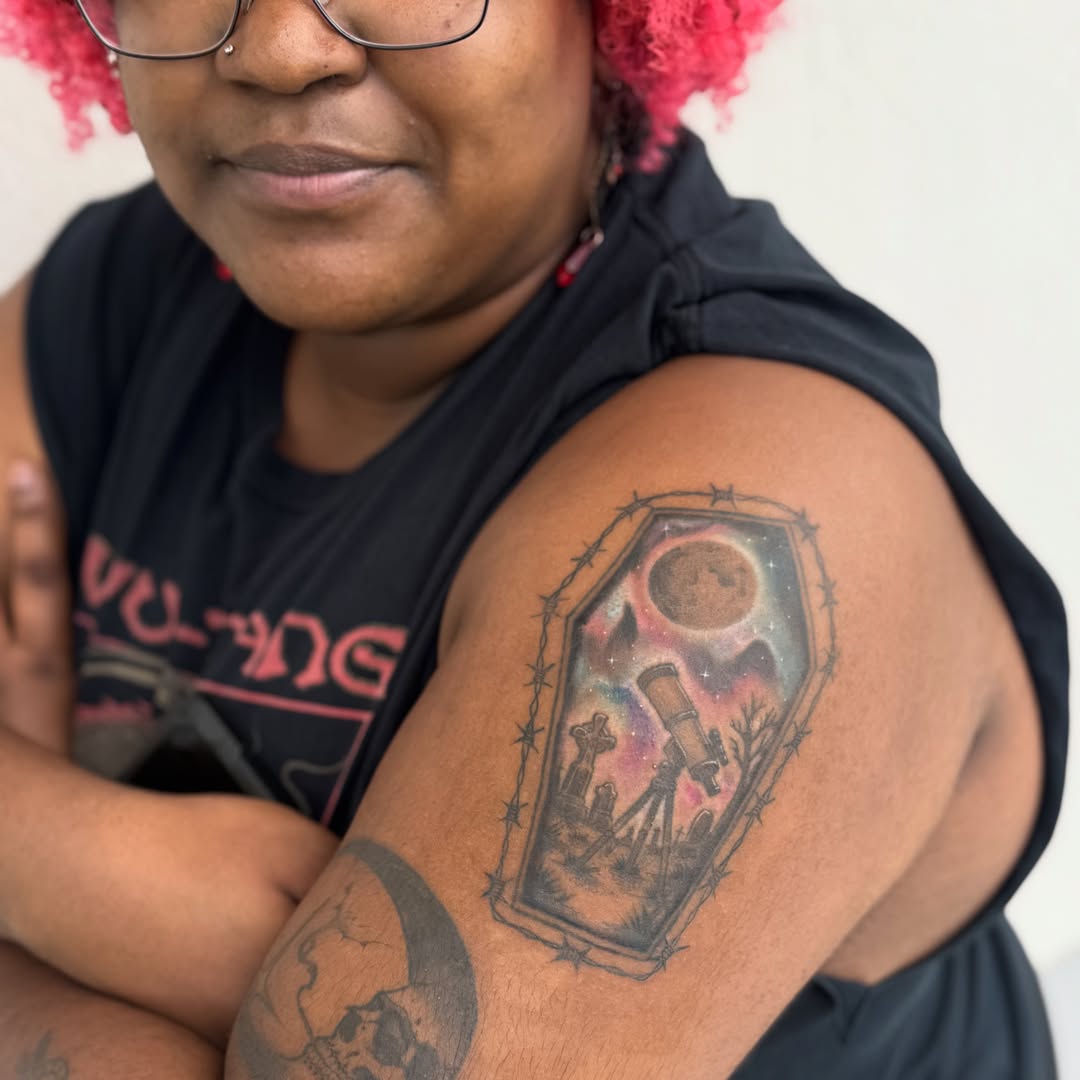 Coffin with celestial elements dark realism tattoo on the shoulder by David