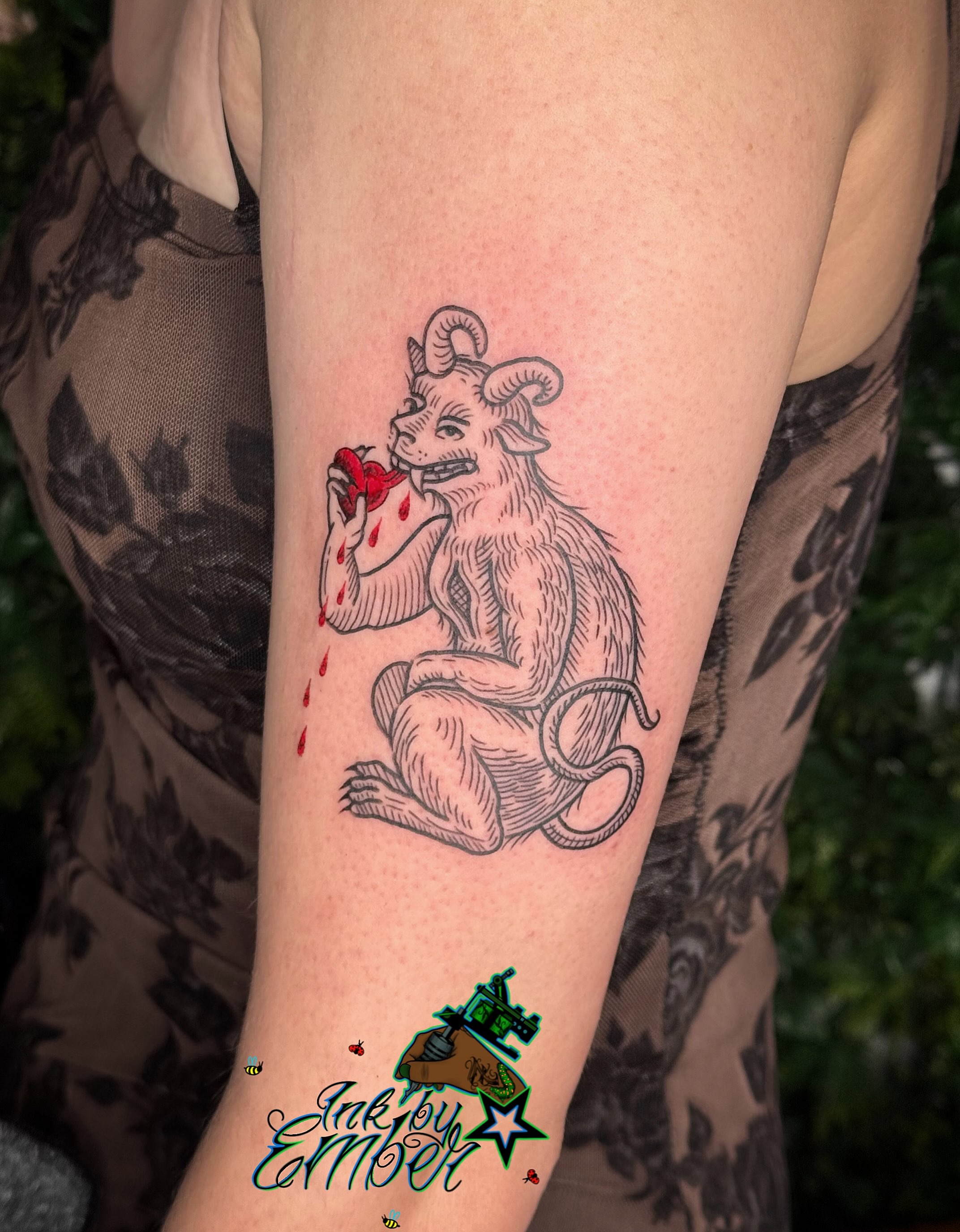 Ram eating heart American traditional tattoo on the forearm by Ember