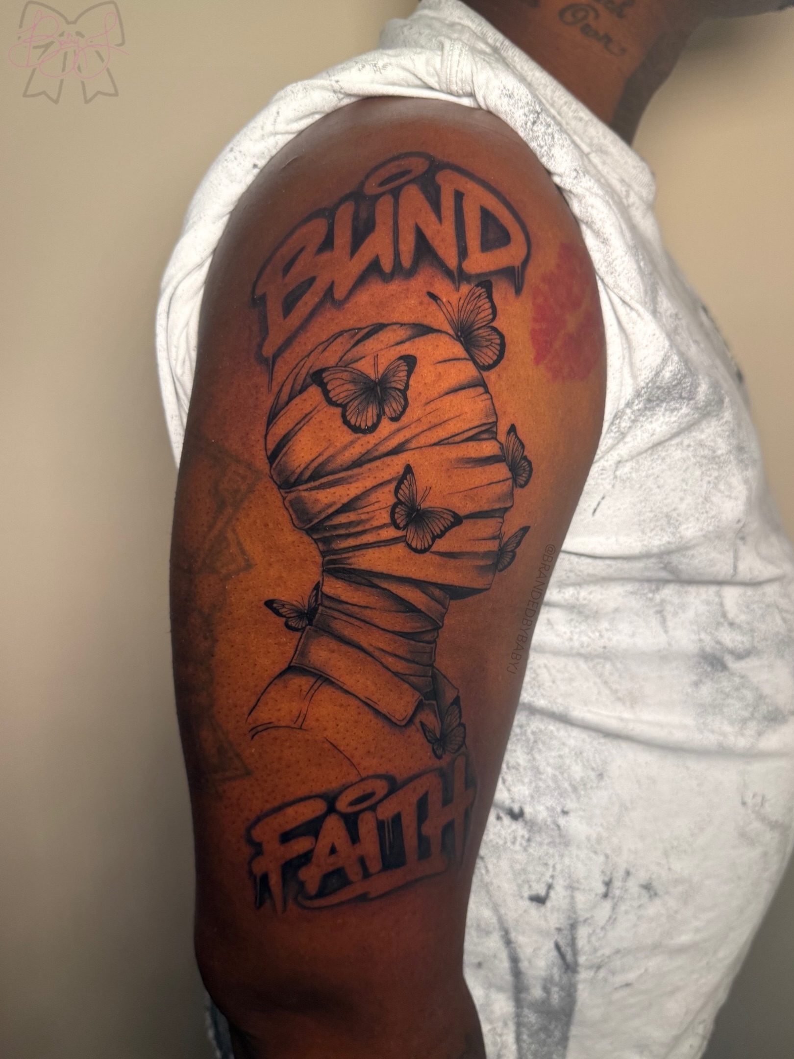 Mummy head with butterflies black and grey tattoo on the upper arm by 𝔹𝔸𝔹𝕐 𝕁 ♡, Cincinnati, Ohio