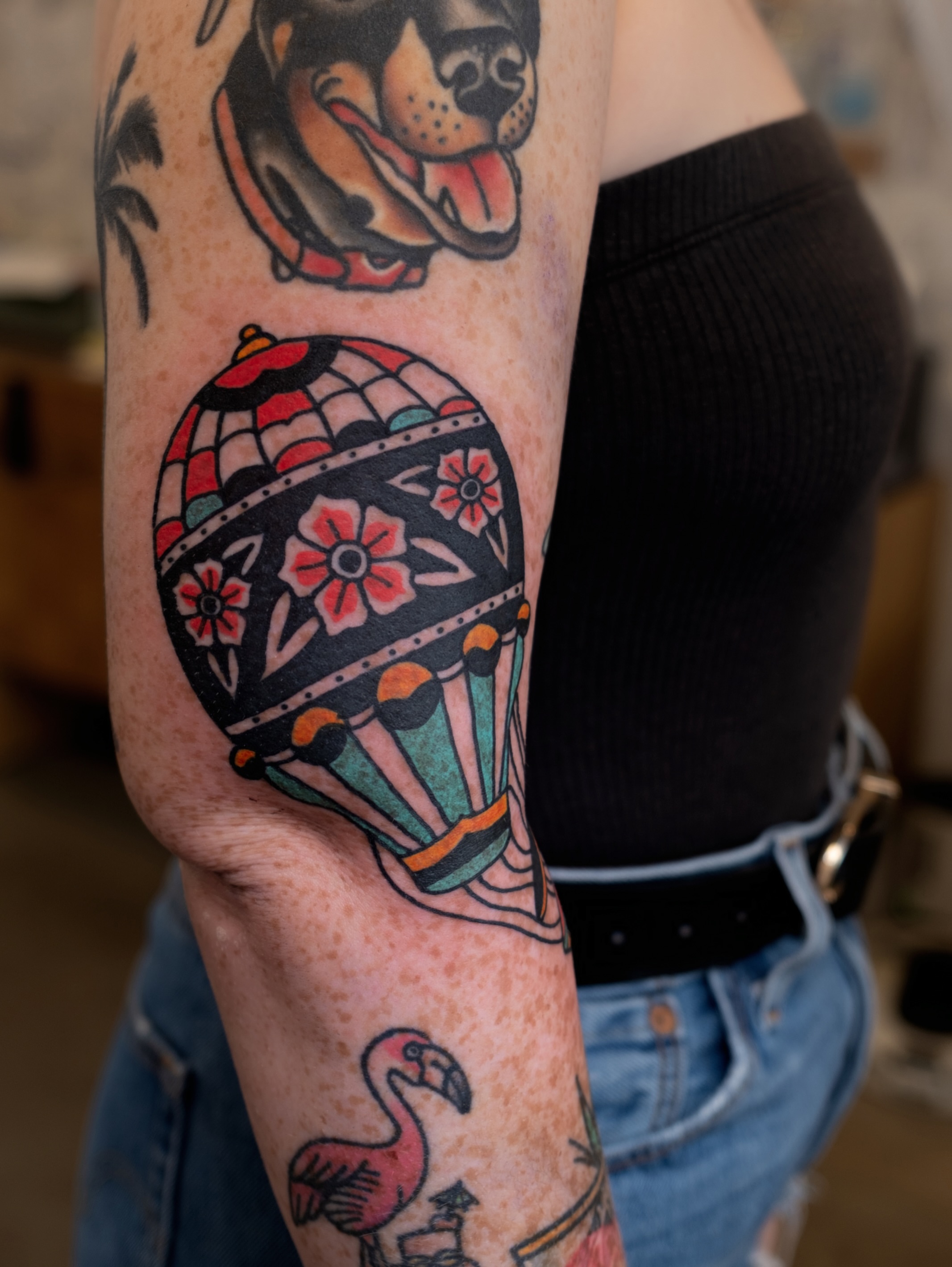 Hot air balloon American traditional tattoo on the forearm by Neto Velasco - Sad Cat Tattoo, Austin, Texas