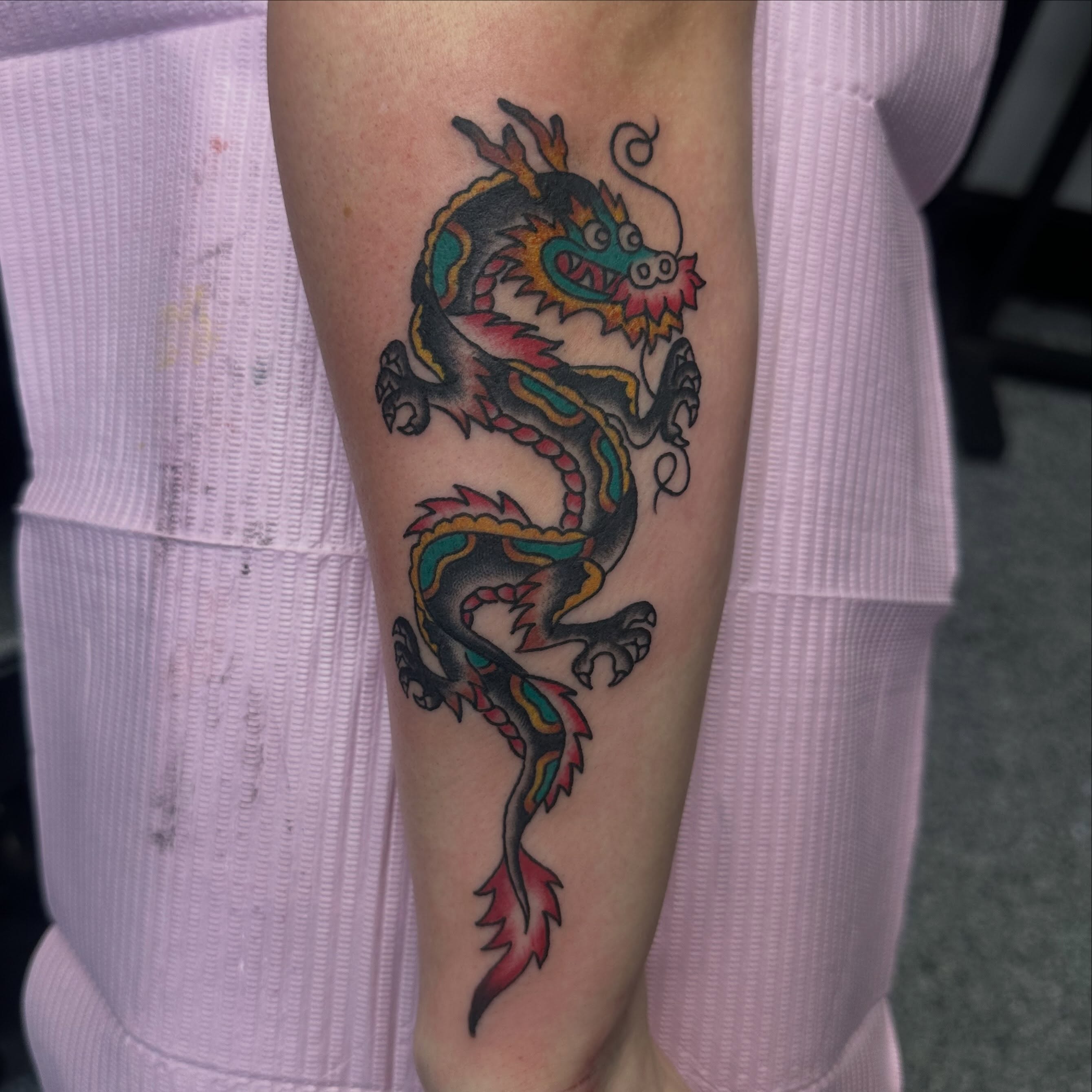 Dragon American traditional tattoo on the forearm by Victoria Parsons, Clarksville, Indiana