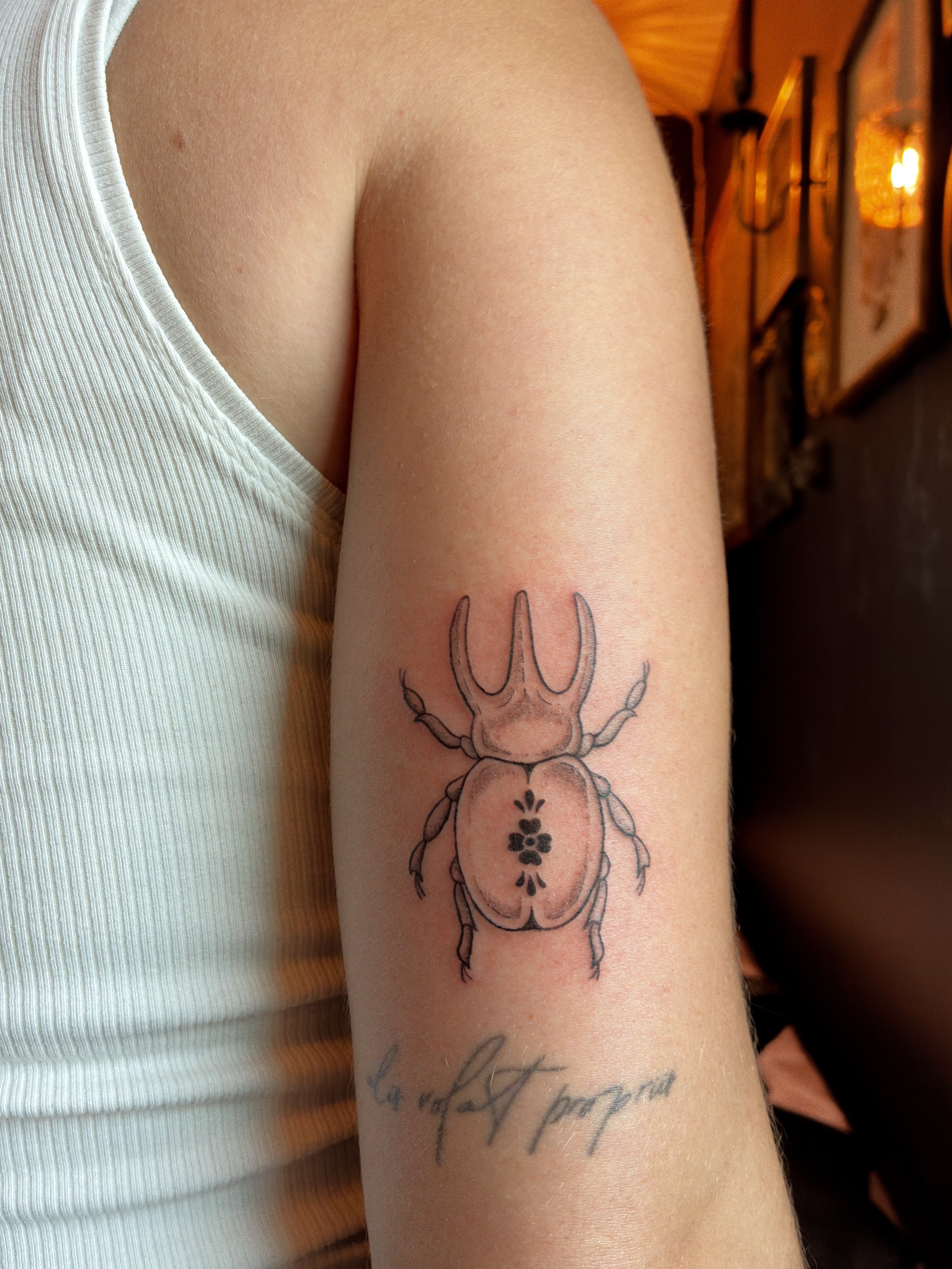 Scarab beetle black and grey tattoo on the forearm by ⊹ Avery Peterson ⊹