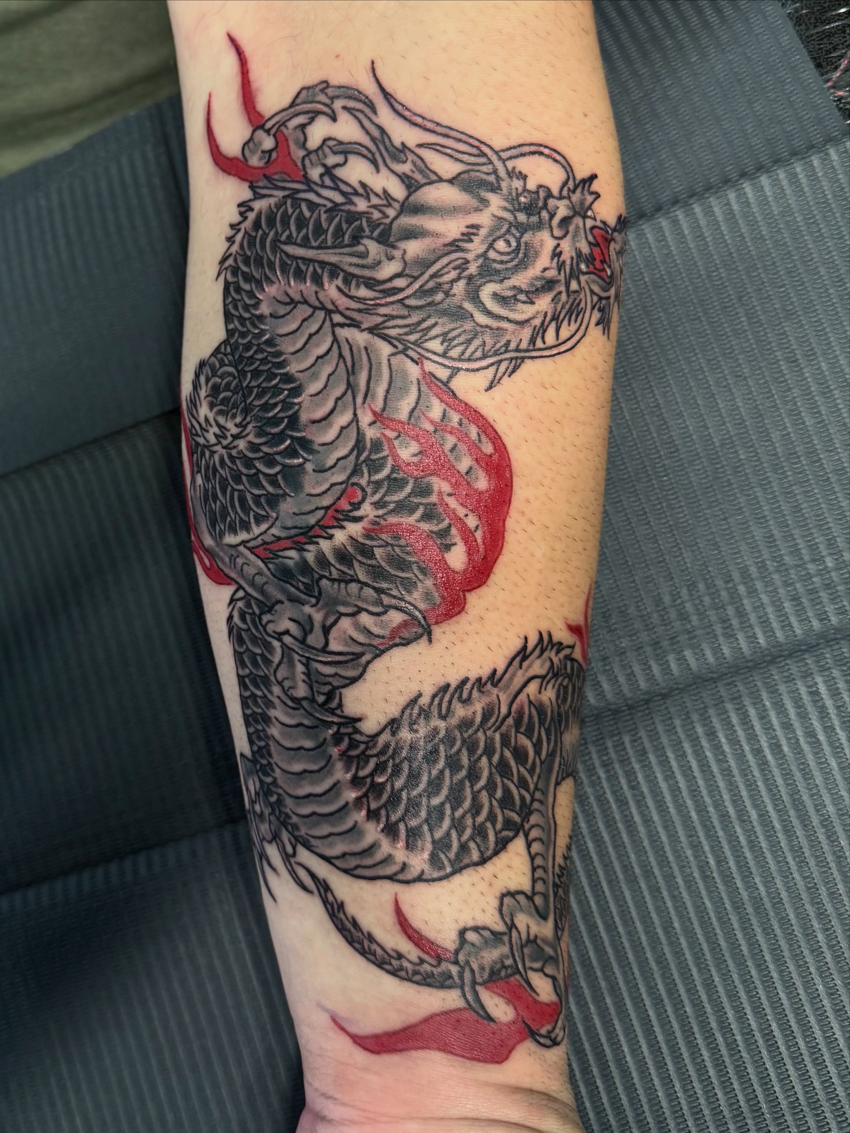 Dragon japanese irezumi tattoo on the forearm by Tyler Bolton